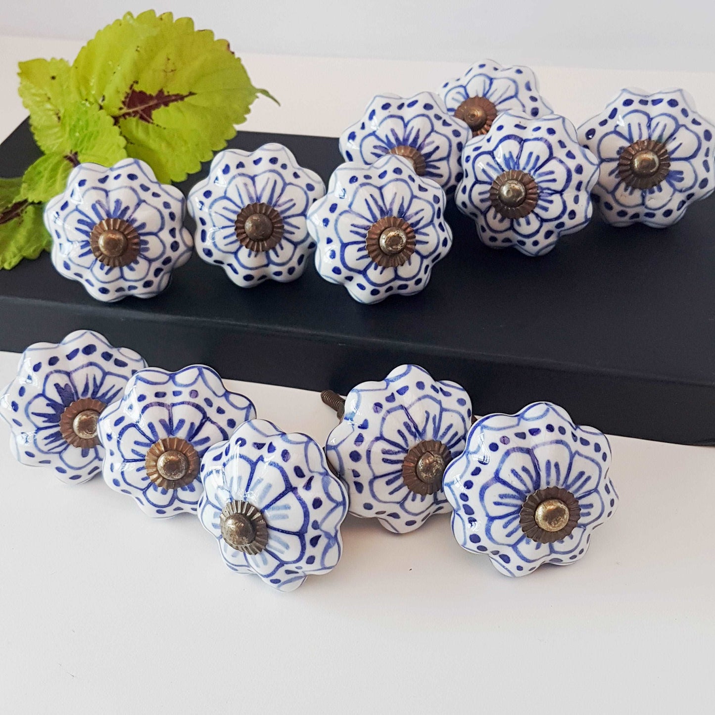 Cabinet knob drawer pull set of 12 in blue & white Delft floral design.
