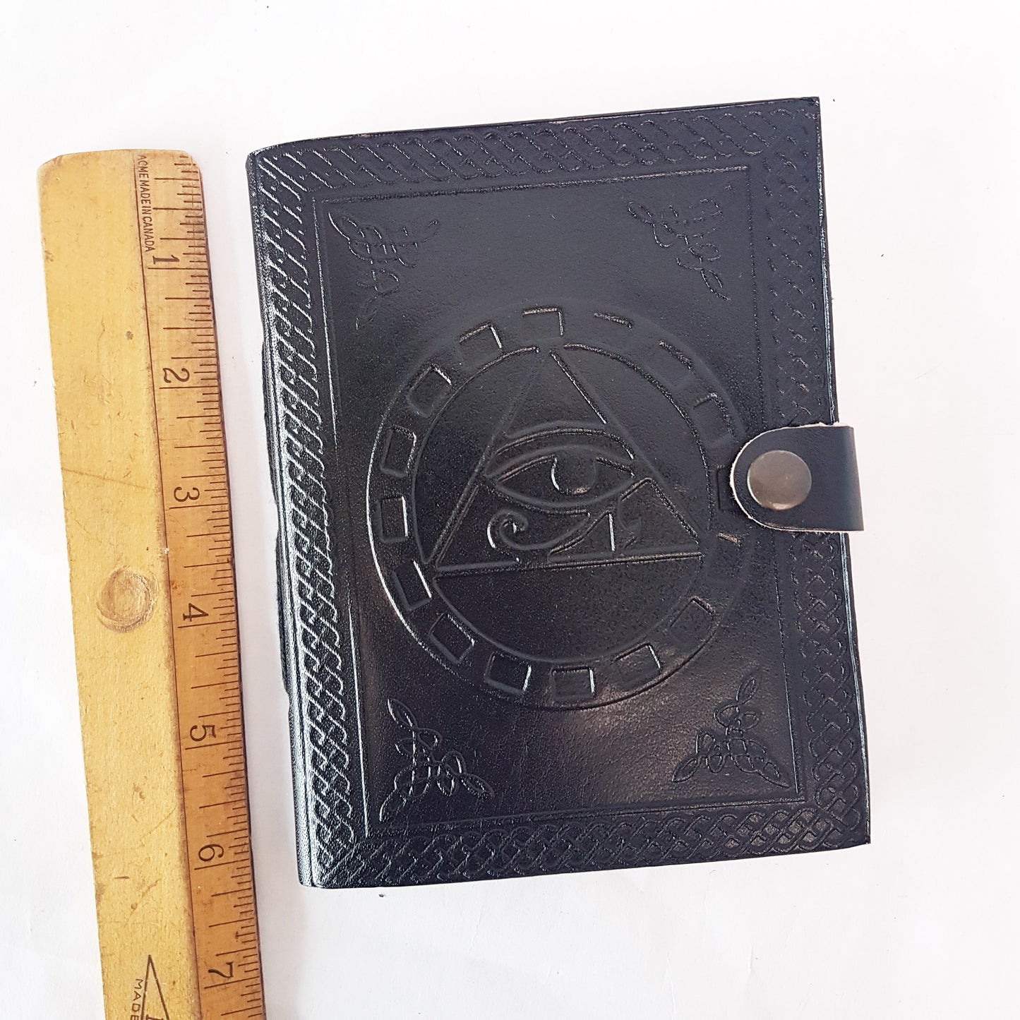 Black Leather bound blank book with an embossed Eye of Horus cover.