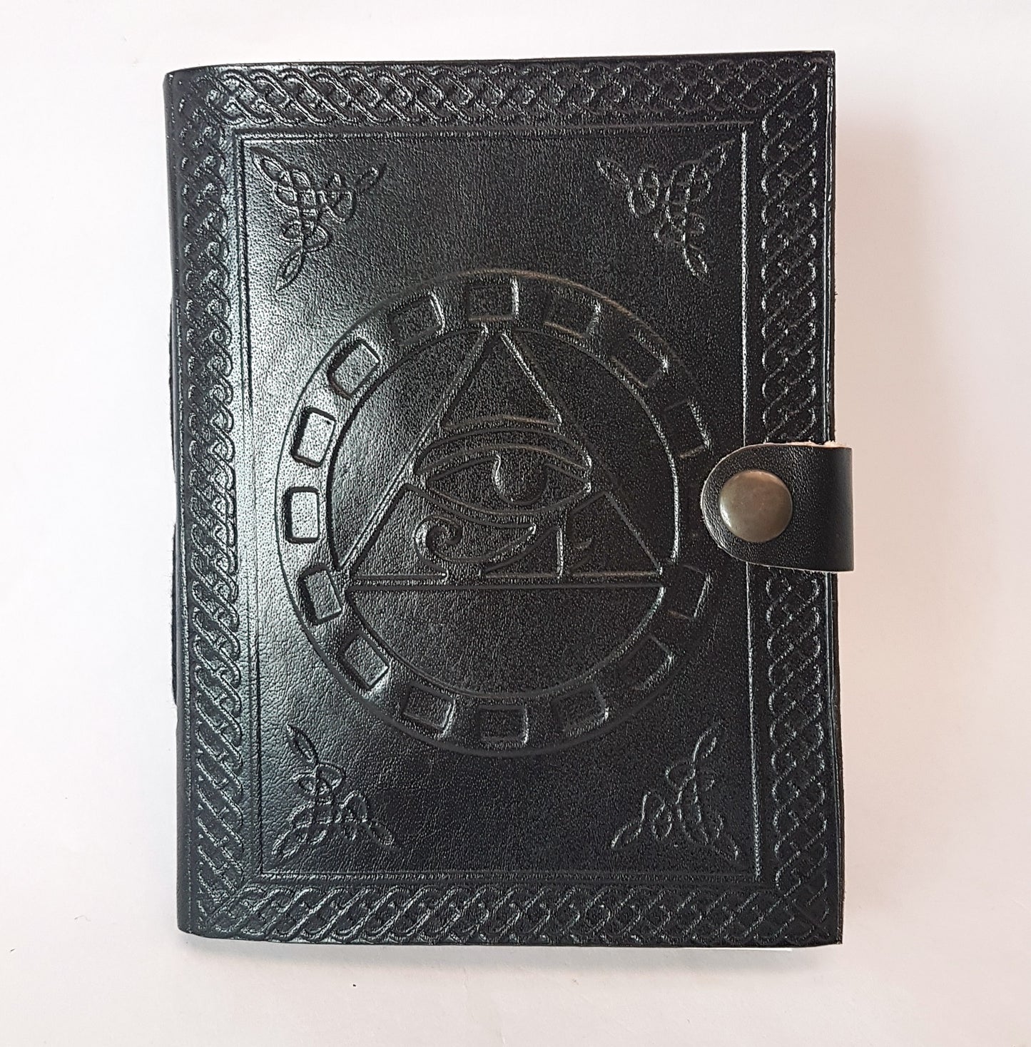 Black Leather bound blank book with an embossed Eye of Horus cover.