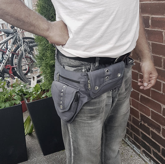 Utility festival pocket belt gray. Adjusts to 48 inches. Unisex design waist-hip-bum bag. Use as travel & shopping money belt. 4 zip pockets. Adjustable to 48 inches.