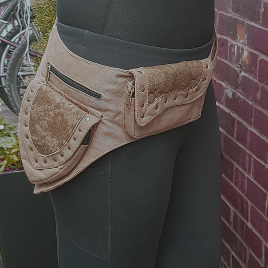 Utility festival rave belt. Khaki tan color waist-hip-bum bag. Adjustable to 48 inches. Rave dance wear with lace detail. 5 zip pockets.