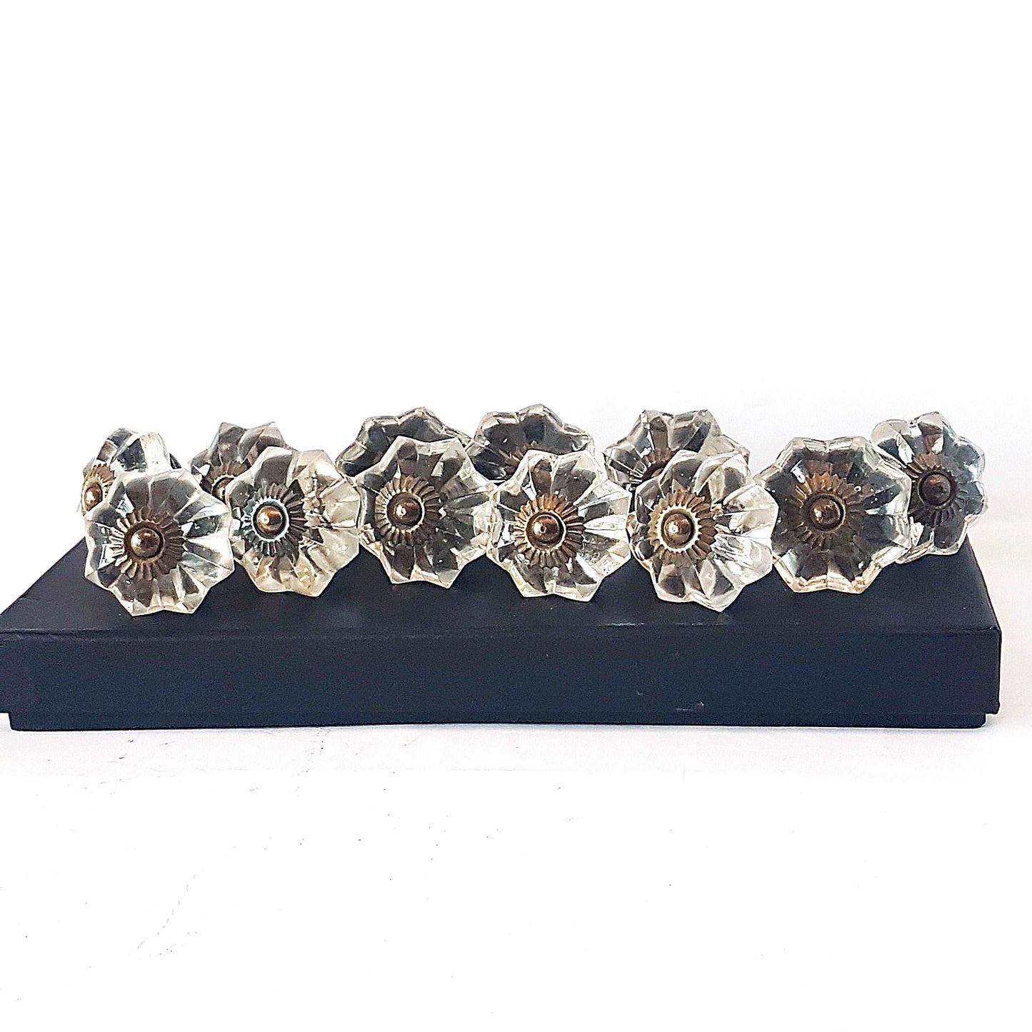 12 clear crystal cabinet knobs. Cut glass pulls in melon shape.