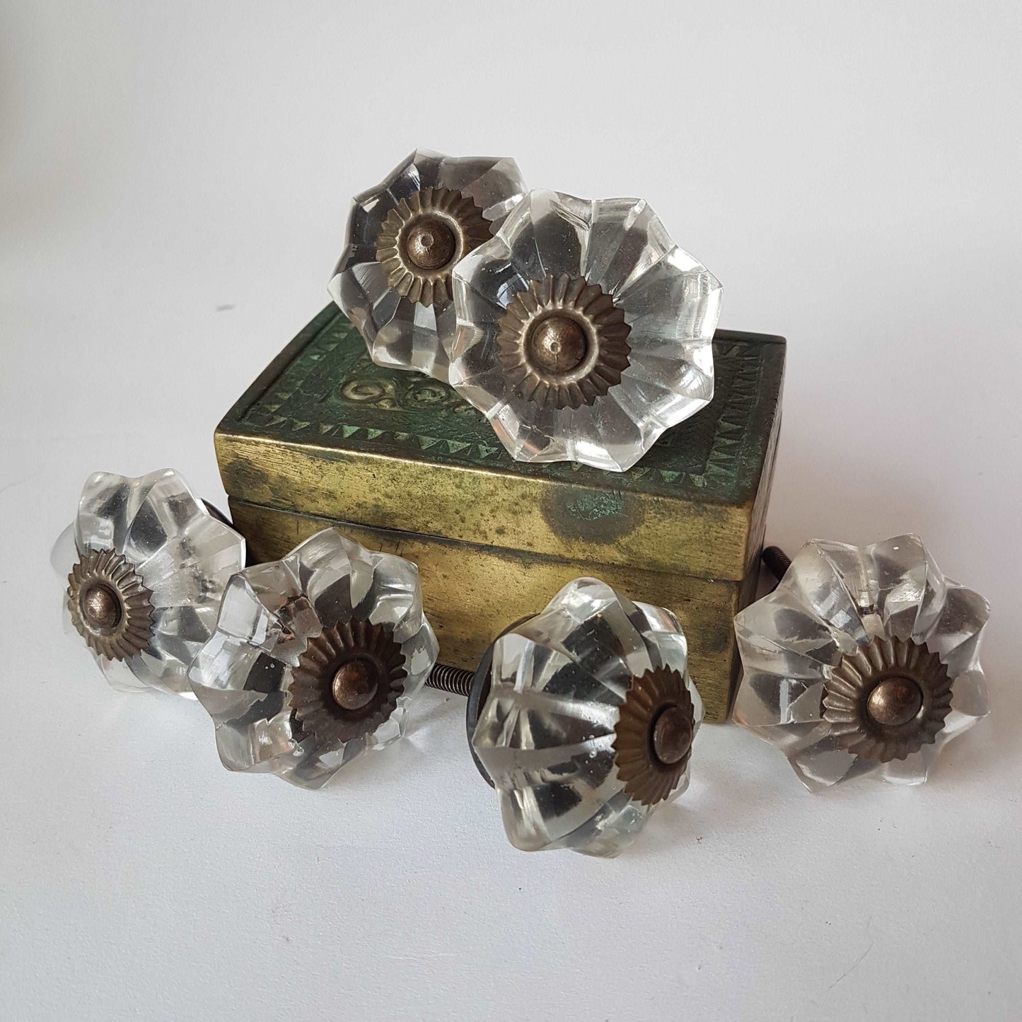 12 clear crystal cabinet knobs. Cut glass pulls in melon shape.