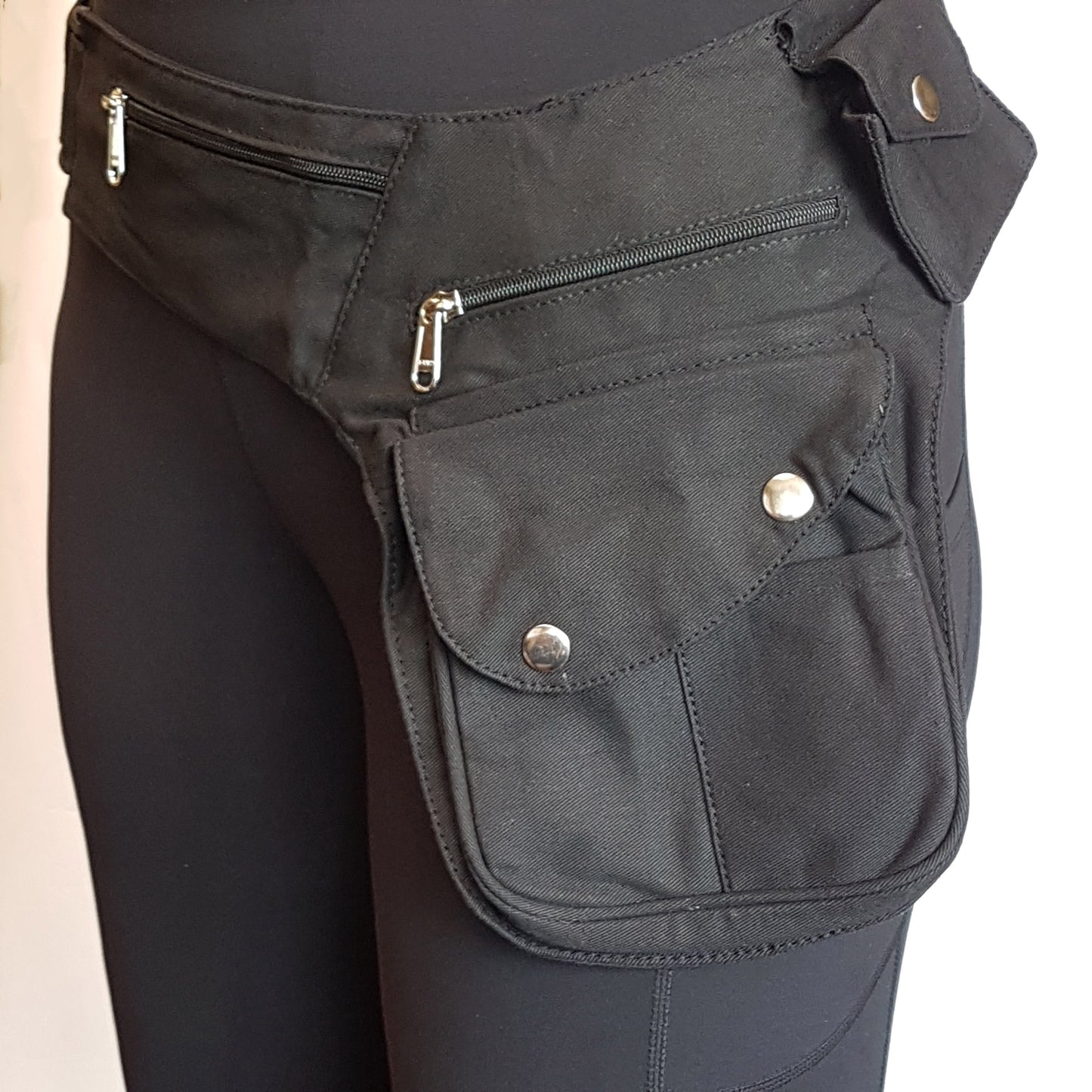 Black Utility Pocket Hip Belt. Adjusts to 48 inches. 6 pocket design.