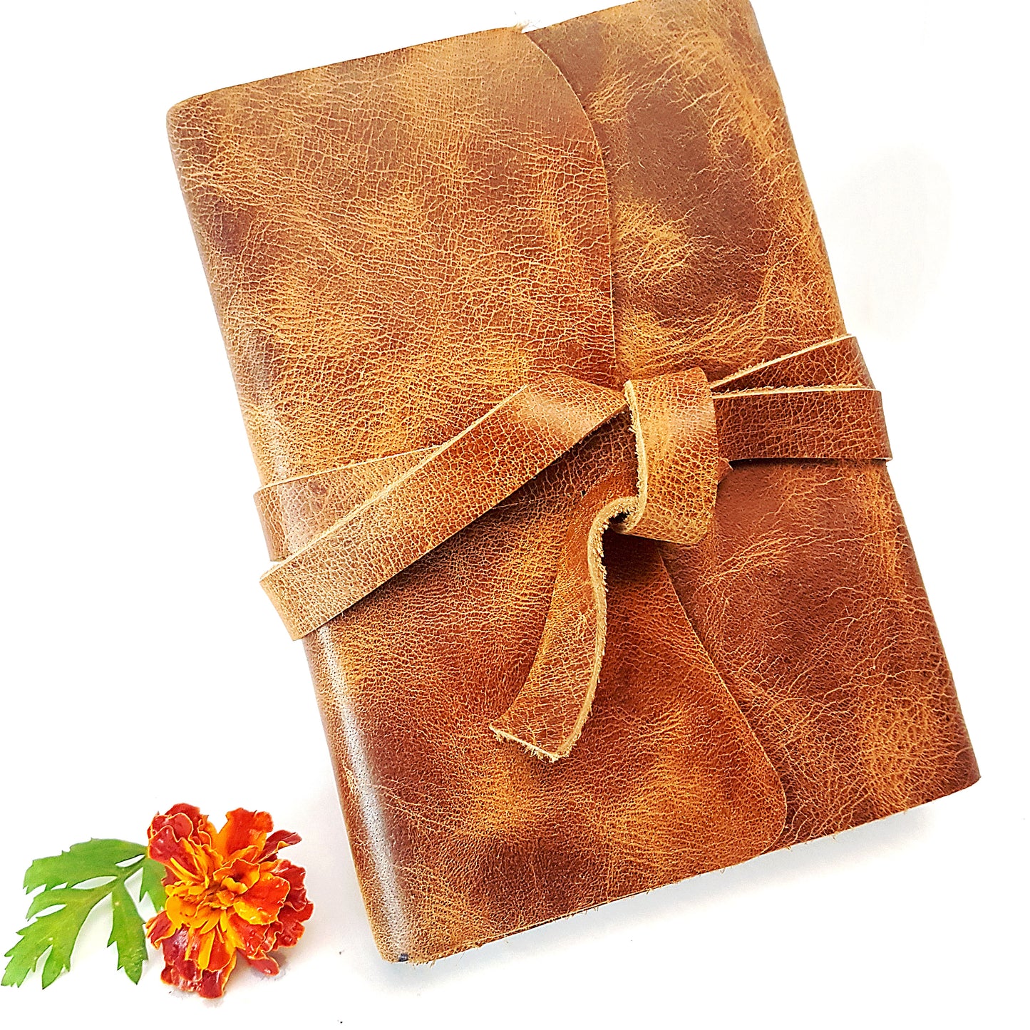 Leather journal blank book with vintage design wrapping strap.