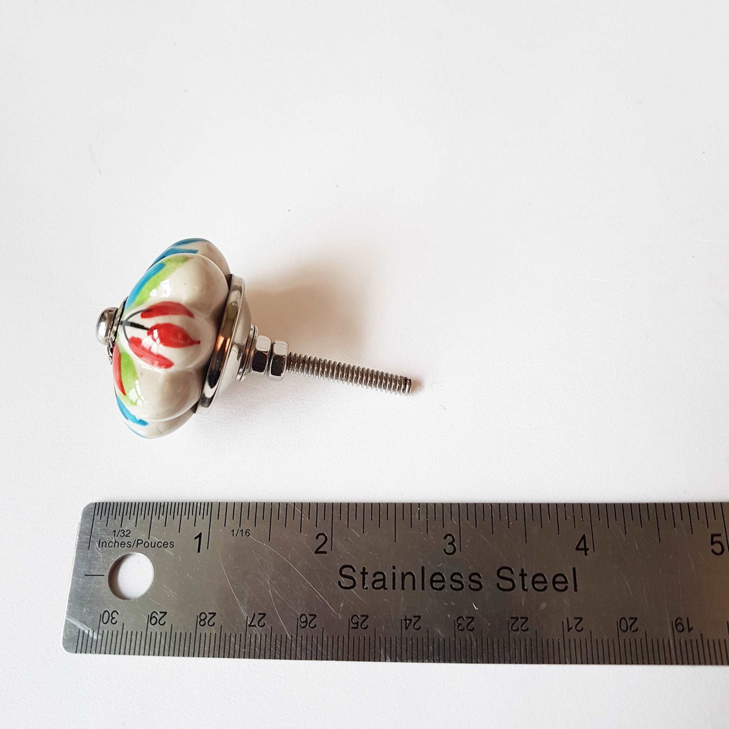 6 cabinet knobs Dolce exclusive collection. Hand painted floral ceramic art. Drawer pulls. one and one half inches in diameter