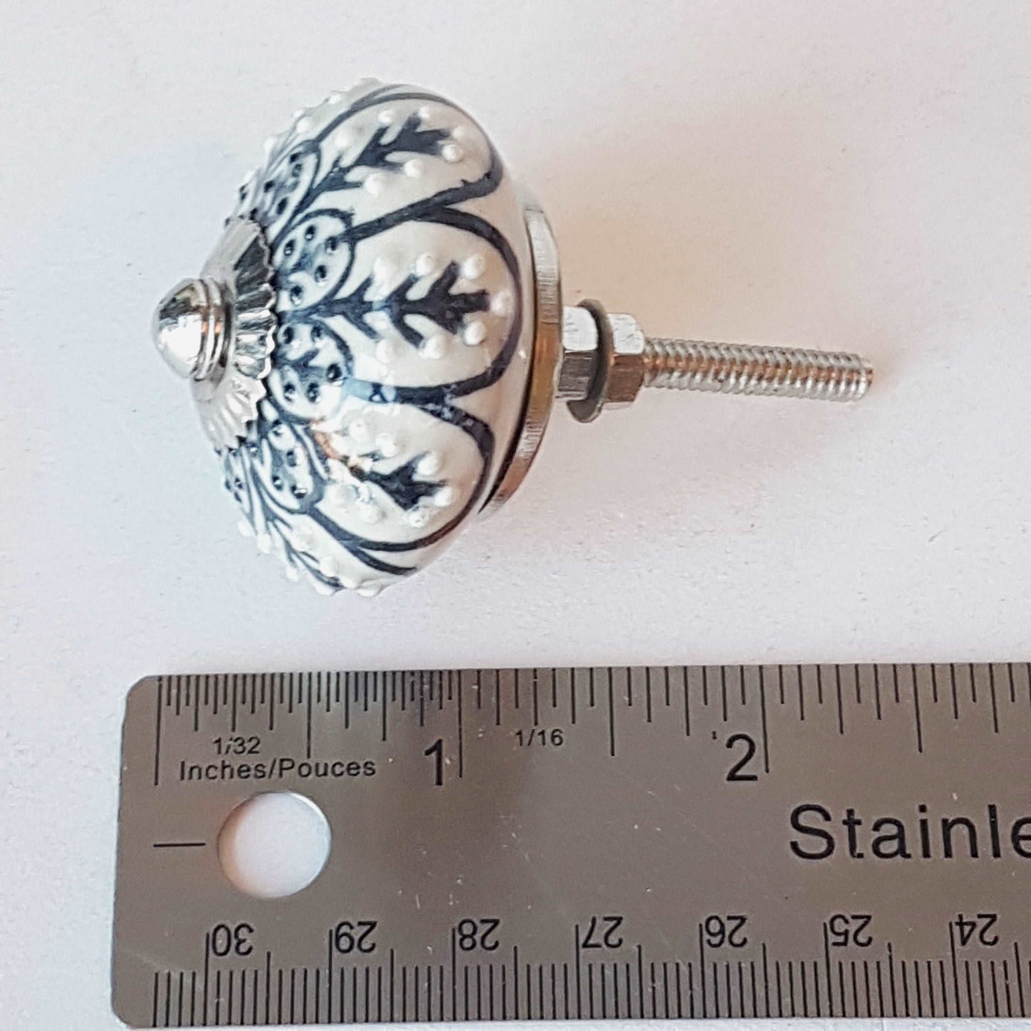 Andromeda set of 8 hand painted cabinet drawer knobs with botanical patterns in black & white. Exclusive designer collection. In stock now!