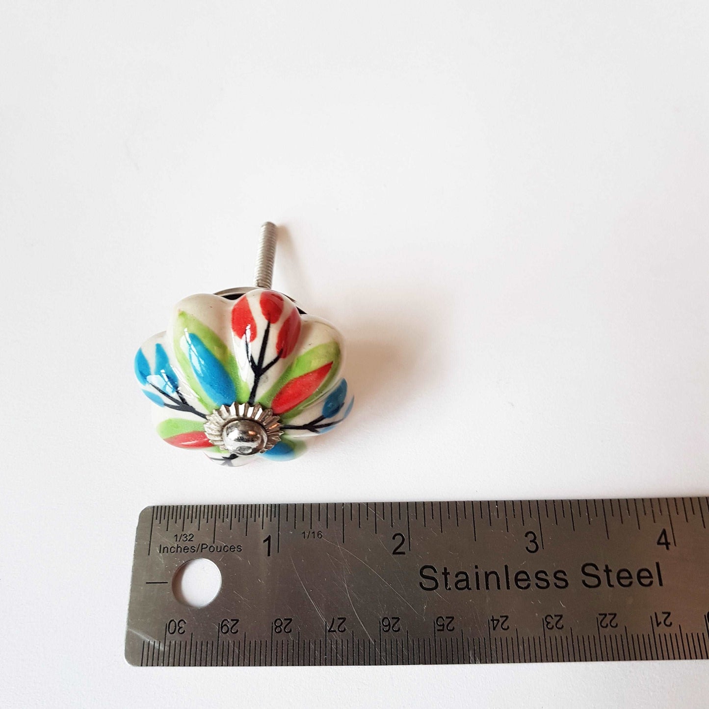 6 cabinet knobs Dolce exclusive collection. Hand painted floral ceramic art. Drawer pulls. one and one half inches in diameter