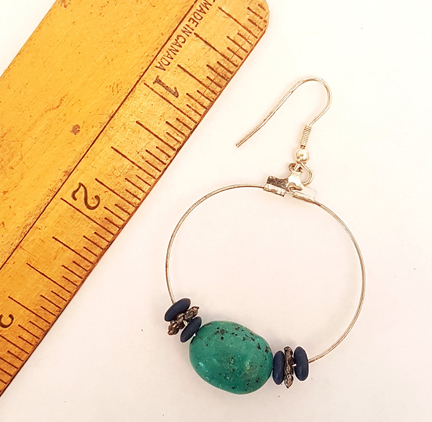 Silver hoop earrings with Tibetan turquoise stones and small Lapis beads.
