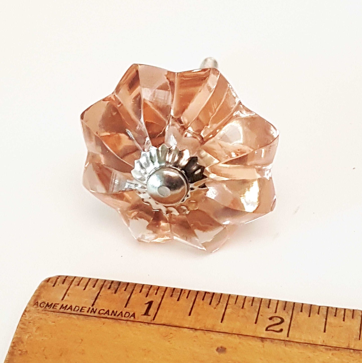 8 cranberry glass cabinet knobs with silver centers. Transparent pink cut glass drawer pulls. For kitchen cupboards, dressers, vanities.