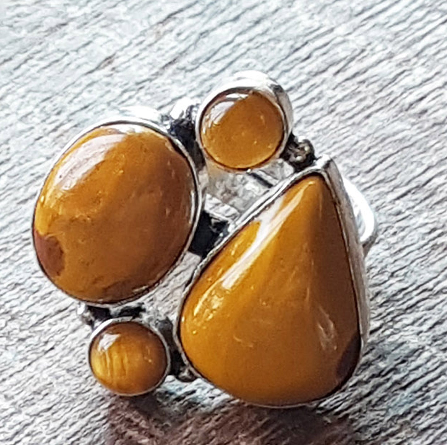 Silver Geometric Ring with 4 Yellow Jasper Gemstones.