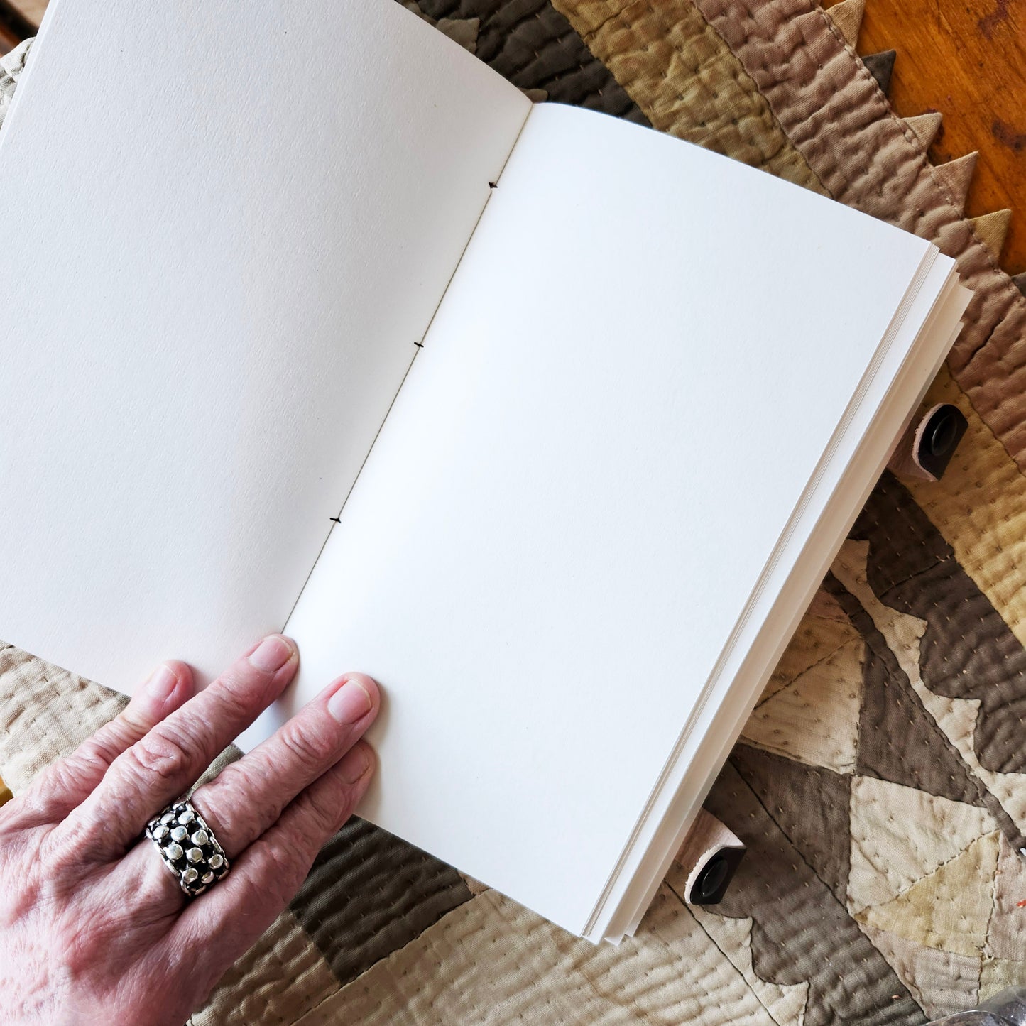 Brown Leather Embossed Journal with an Inlaid Tigers Eye Gemstone Cover.