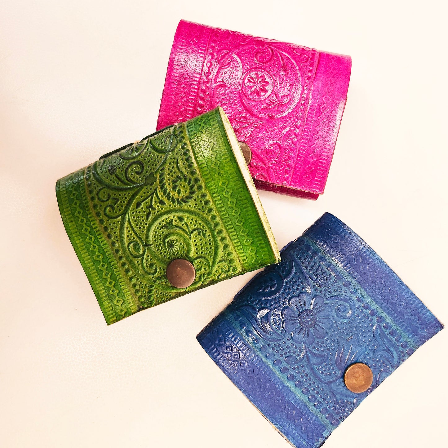 Set of 3 Colorful Engraved Leather 3 Inch Pocket Diaries.