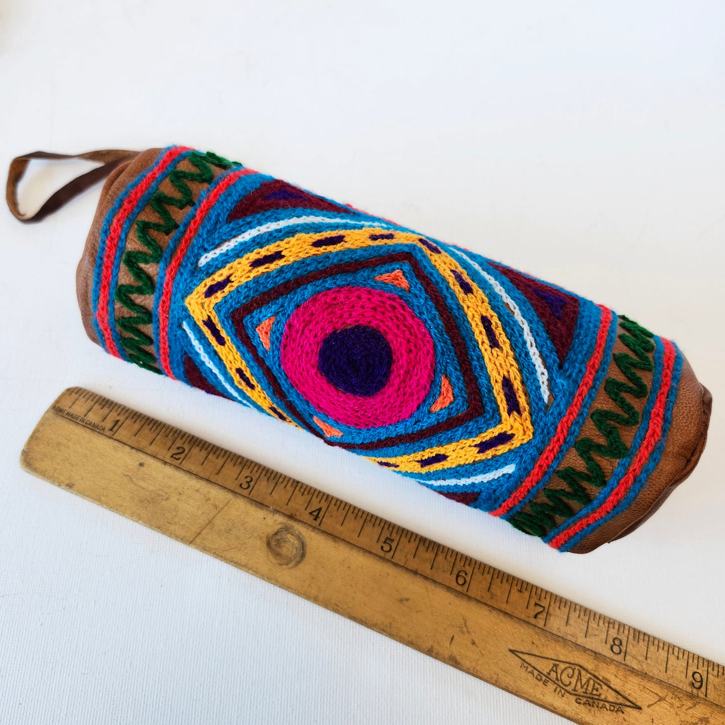 Leather Tube Pouch with a Colorful Hand Embroidered Boho Hippie design.