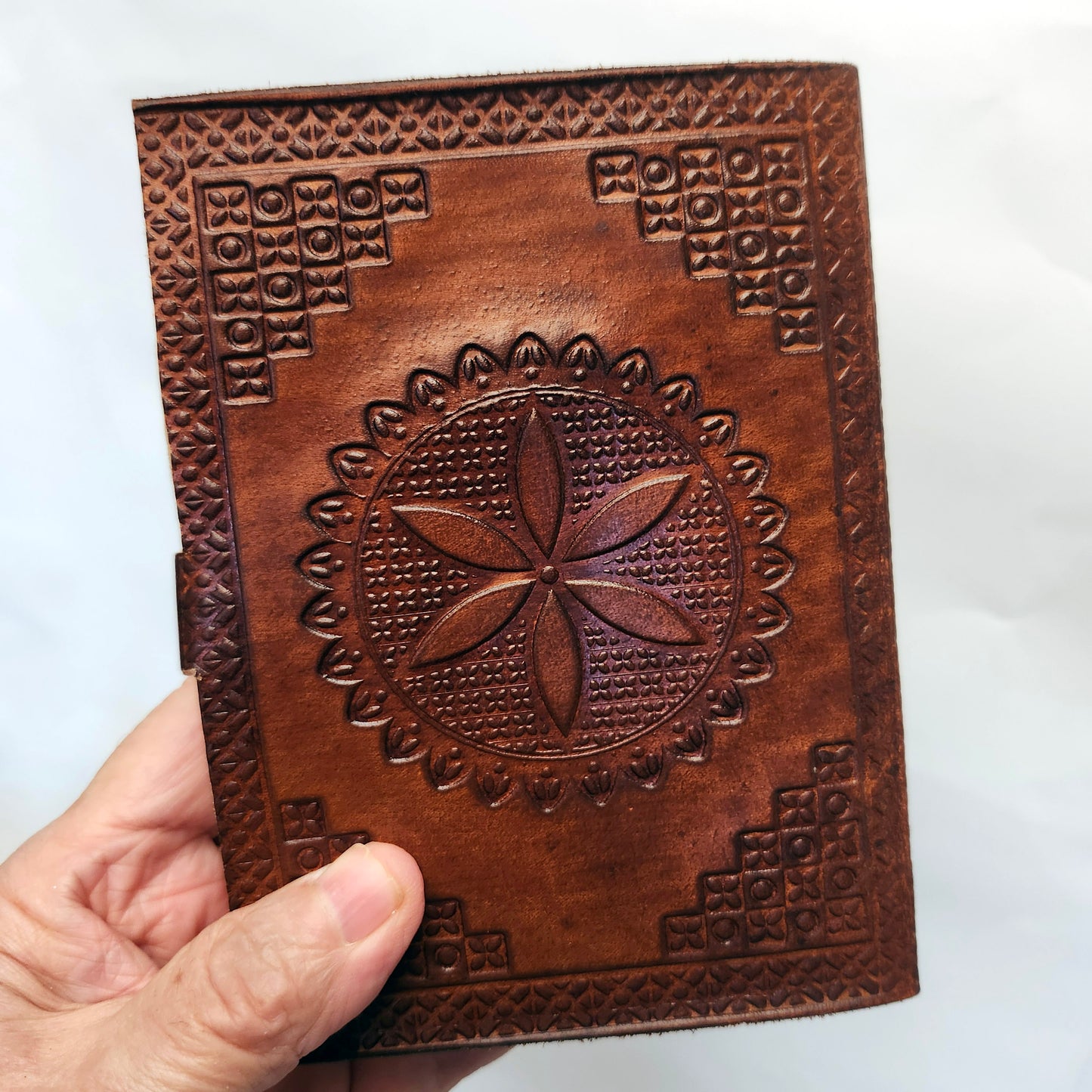 Brown Leather Bound Blank Page Journal with a Turquoise Center Gemstone.