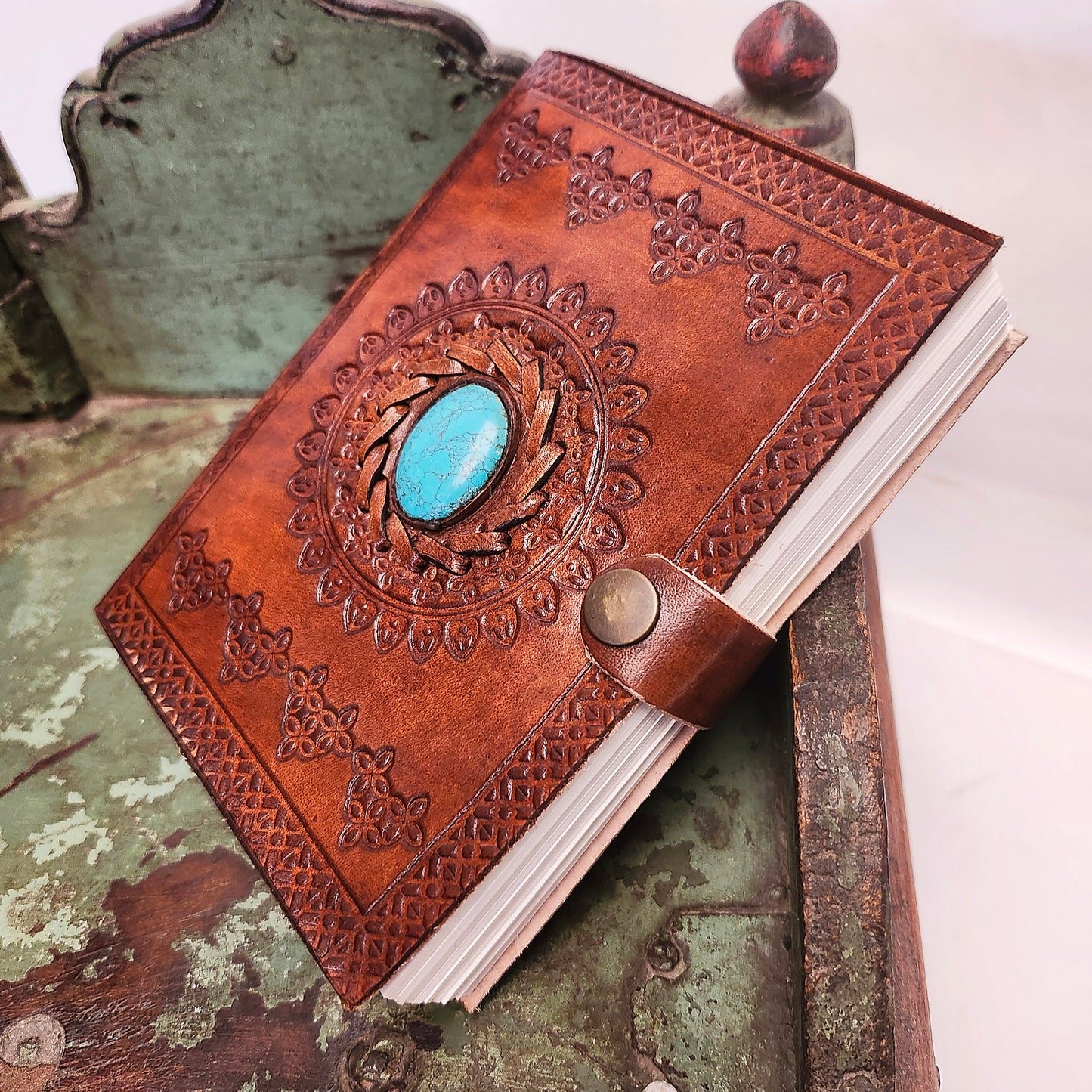 Brown Leather Bound Blank Page Journal with a Turquoise Center Gemstone.