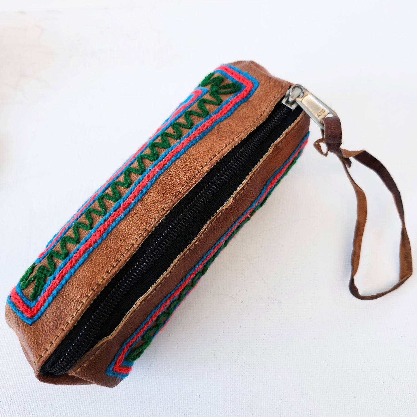 Leather Tube Pouch with a Colorful Hand Embroidered Boho Hippie design.