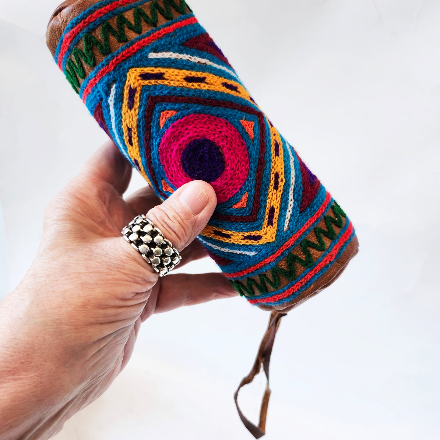 Leather Tube Pouch with a Colorful Hand Embroidered Boho Hippie design.