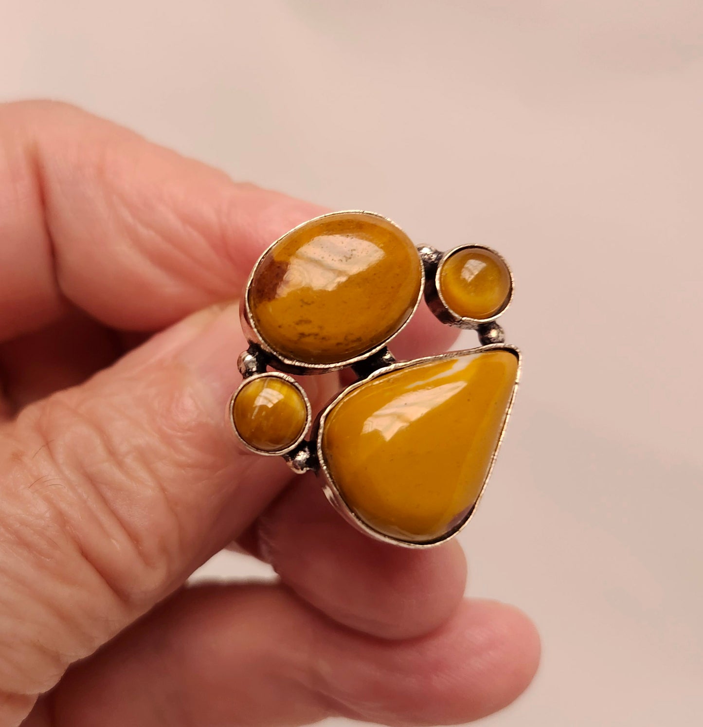 Silver Geometric Ring with 4 Yellow Jasper Gemstones.