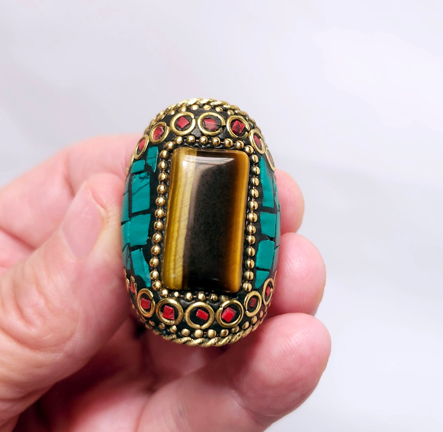 Turquoise Mosaic Ring with a Rectangular Tiger Eye Gemstone.