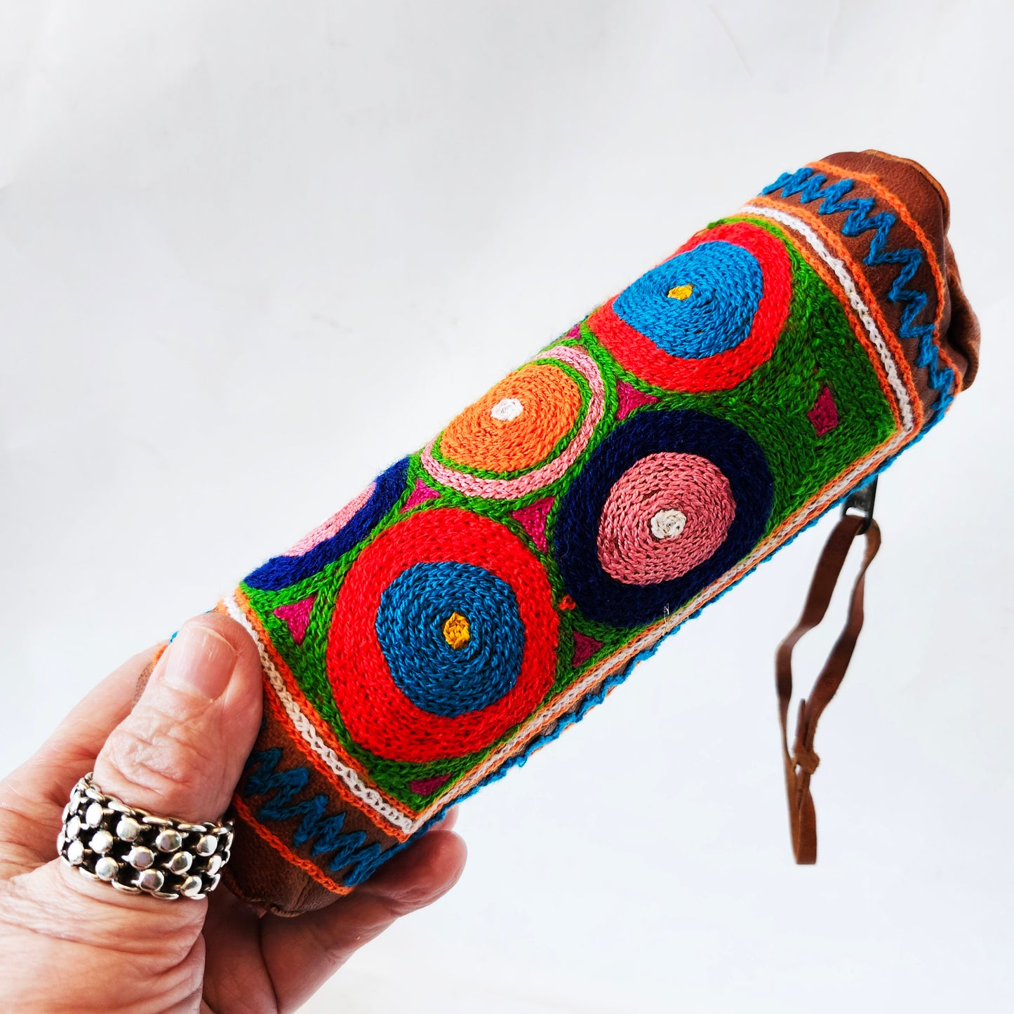 Leather Tube Pouch with a Colorful Hand Embroidered Boho Hippie design.