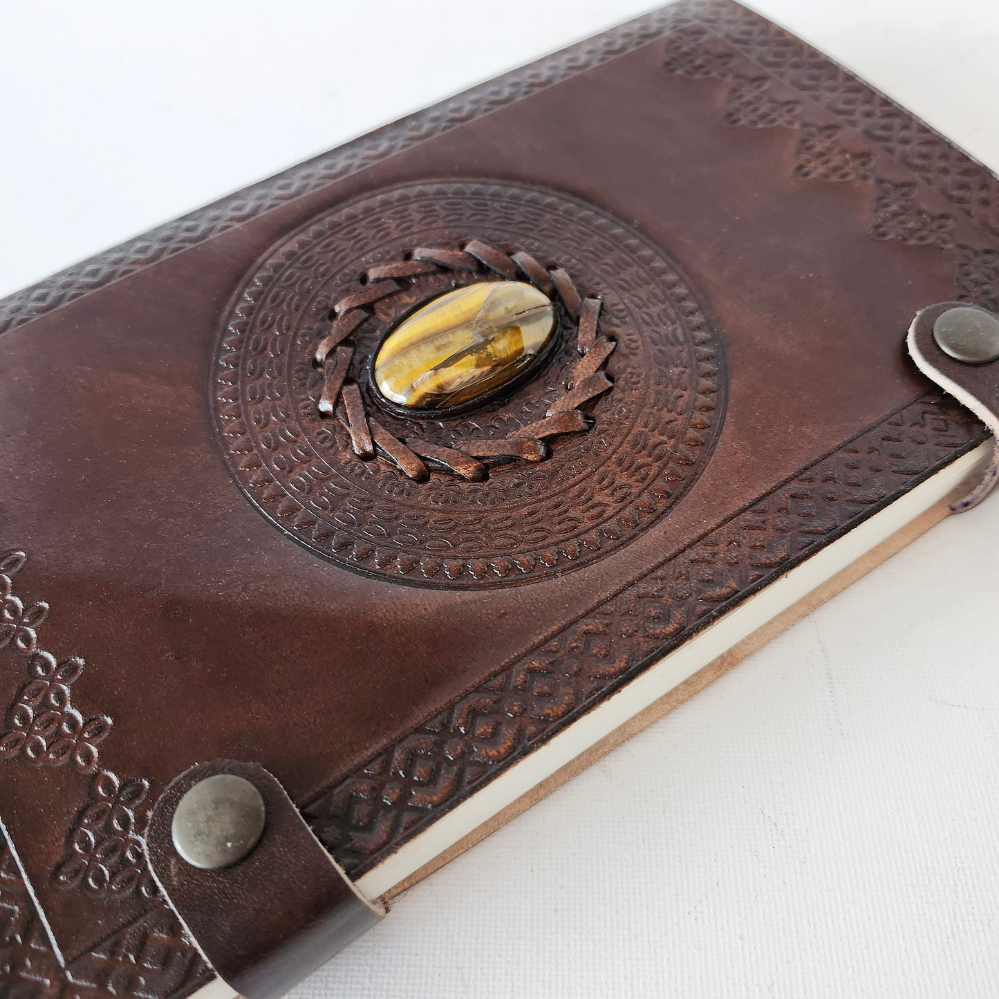 Brown Leather Embossed Journal with an Inlaid Tigers Eye Gemstone Cover.