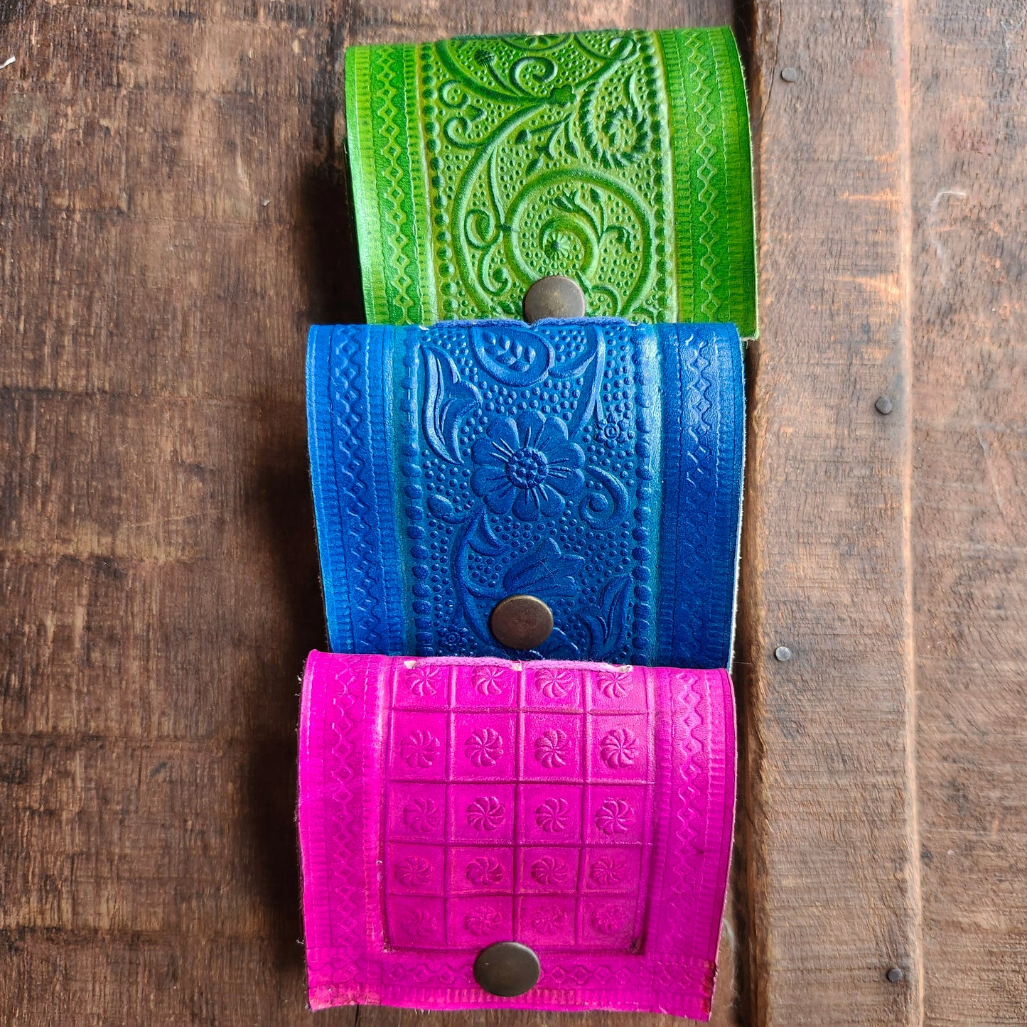 Set of 3 Colorful Engraved Leather 3 Inch Pocket Diaries.