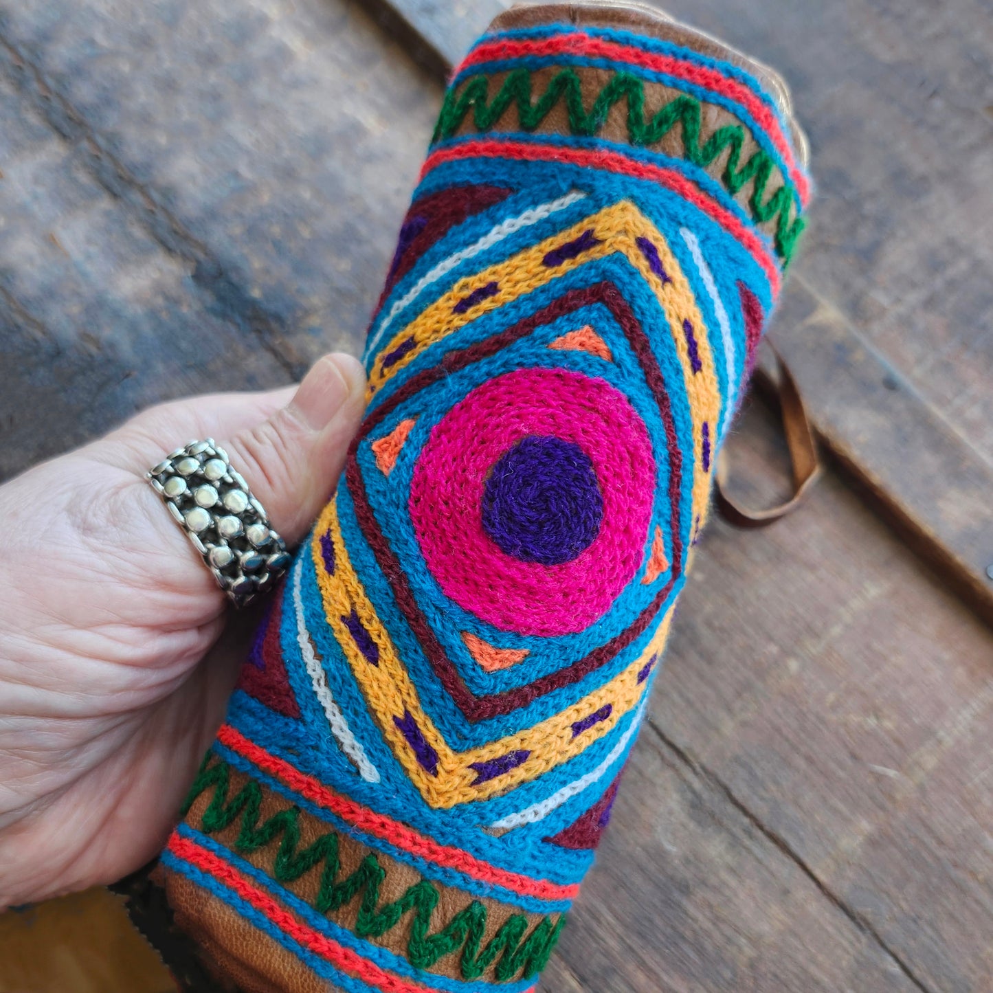Leather Tube Pouch with a Colorful Hand Embroidered Boho Hippie design.
