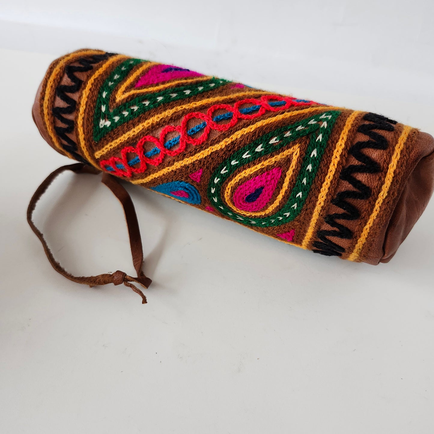 Leather Tube Pouch with a Colorful Hand Embroidered Boho Hippie design.