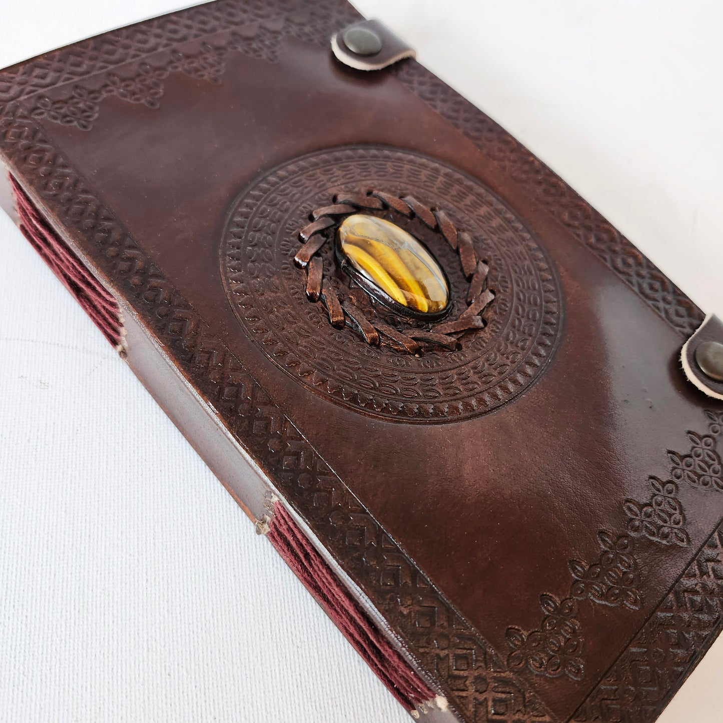 Brown Leather Embossed Journal with an Inlaid Tigers Eye Gemstone Cover.