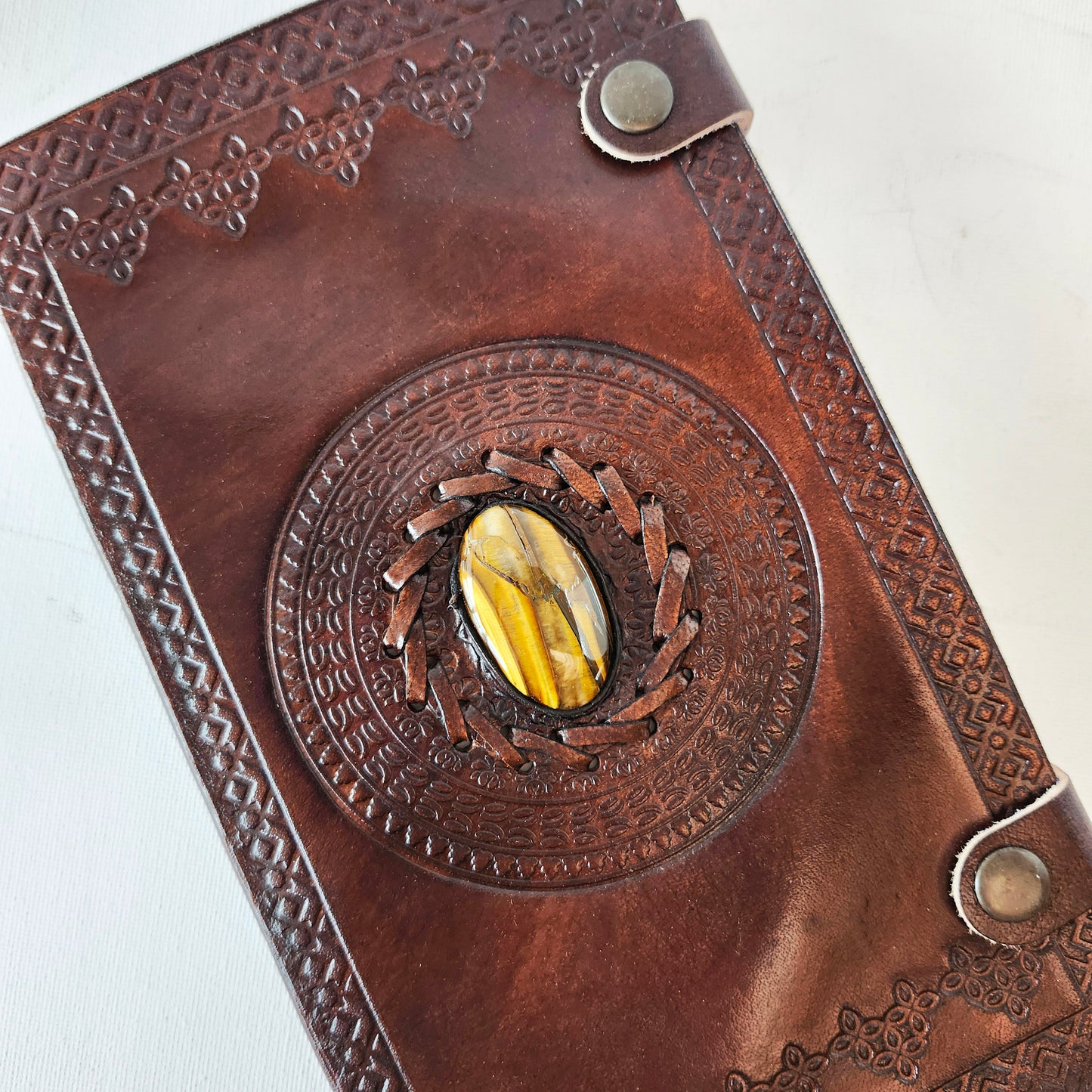 Brown Leather Embossed Journal with an Inlaid Tigers Eye Gemstone Cover.