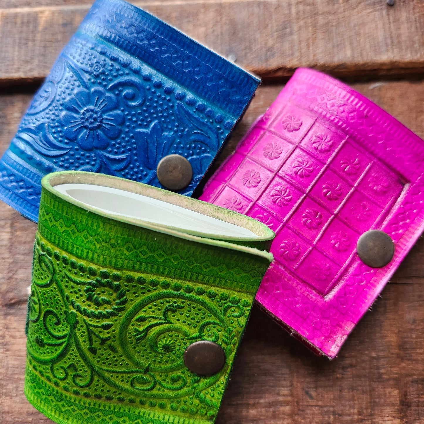Set of 3 Colorful Engraved Leather 3 Inch Pocket Diaries.