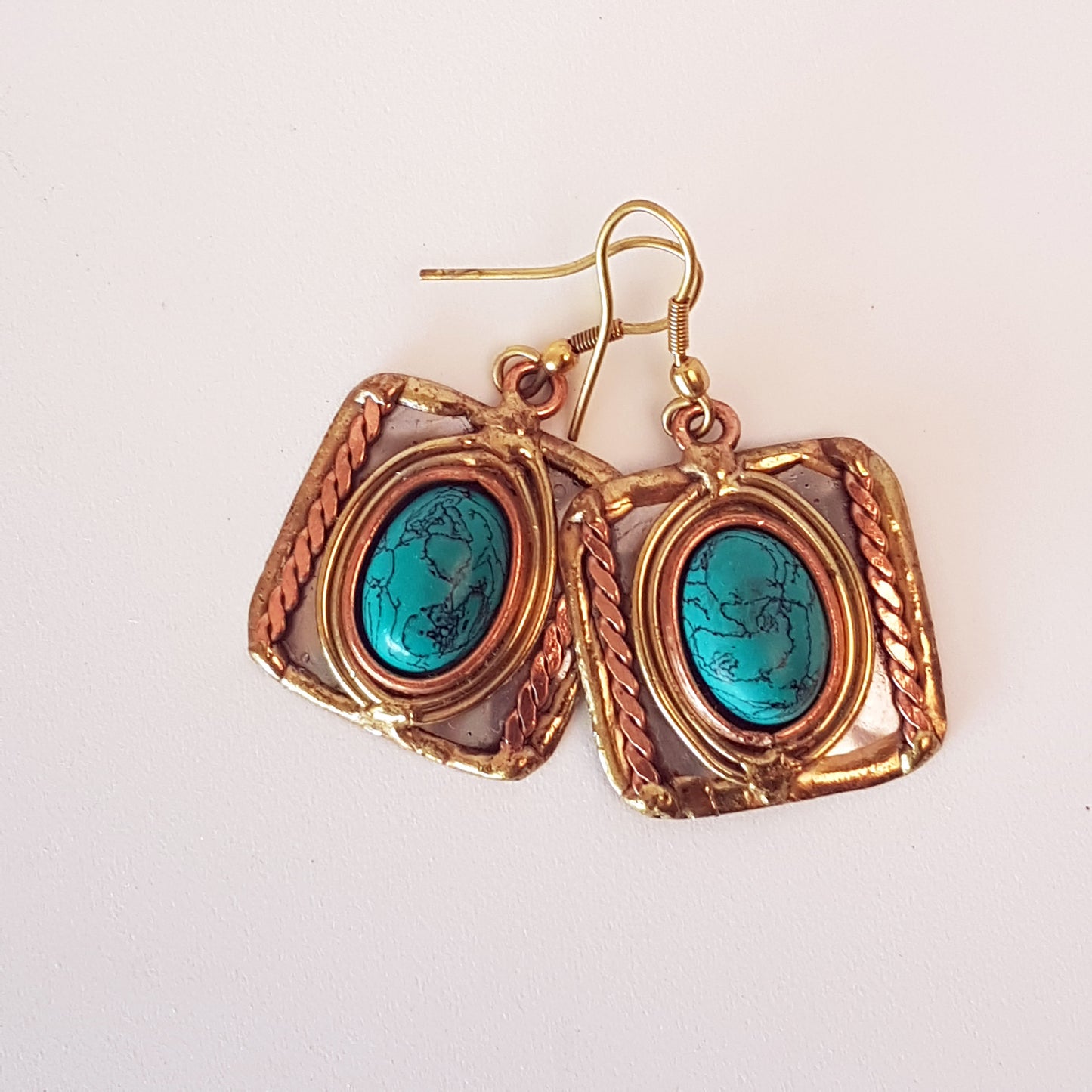Square Shape Turquoise Gemstone Earrings in a Unique Silver-Gold Setting.