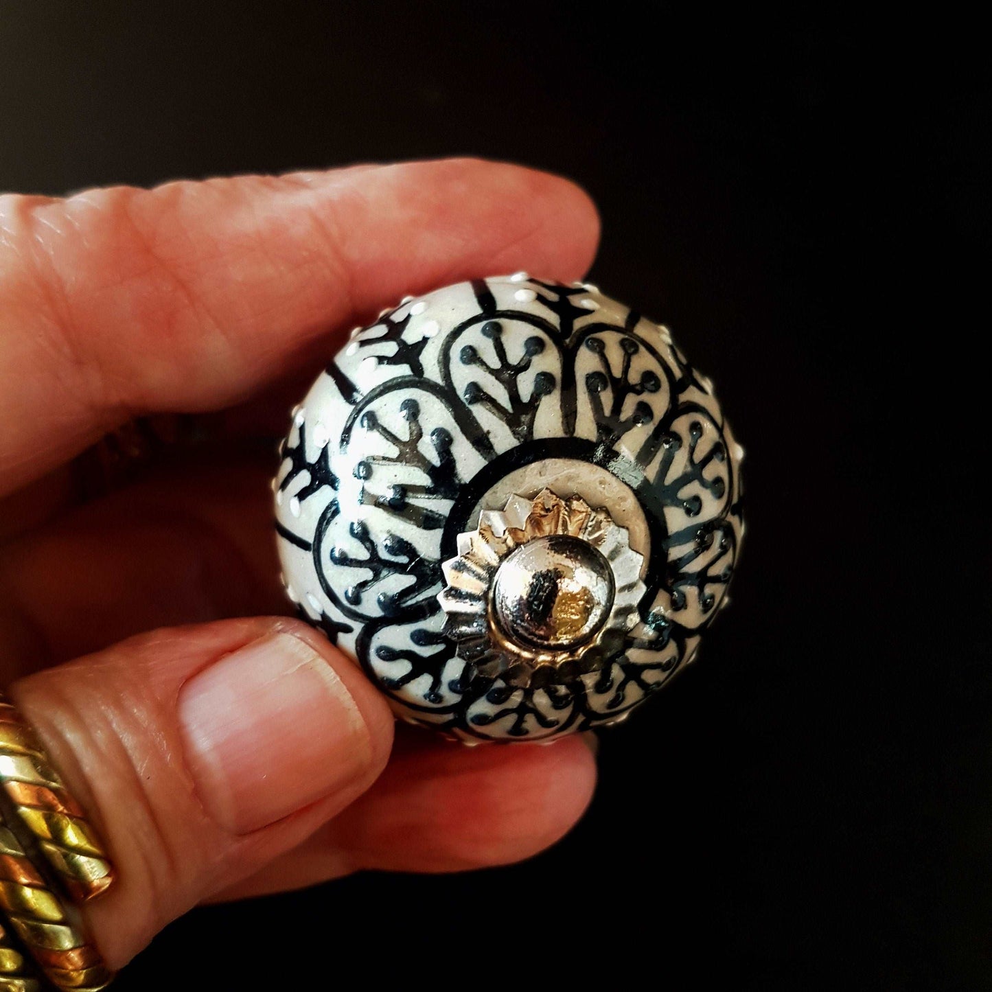 8 cabinet knob-drawer pulls in black, slate grey and cream. Elegance hand painted floral designs with silver hardware.1.5 inch in diameter. - Vintage India Ca