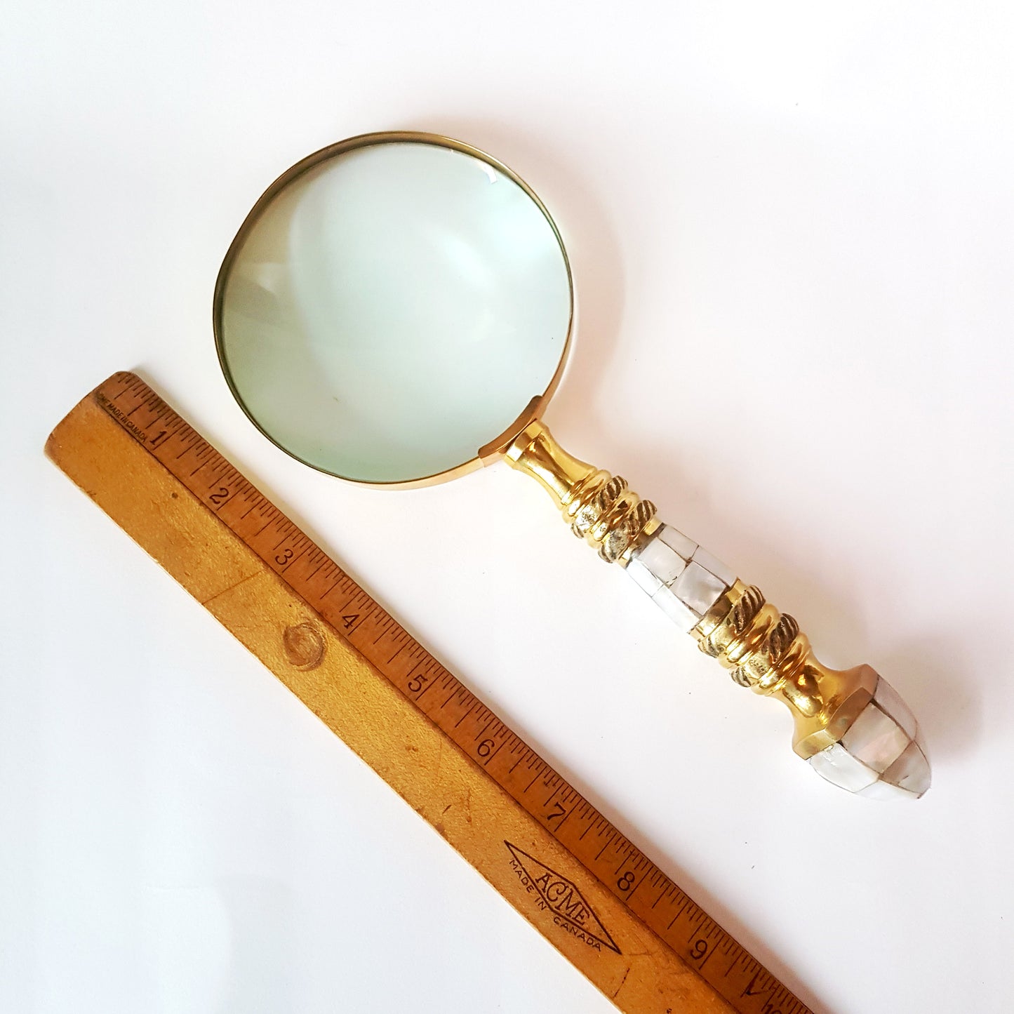 Vintage magnifying glass hand lens in antique brass design. Old world charm. Read small print easily, use for home & hobby. Photos stamps.