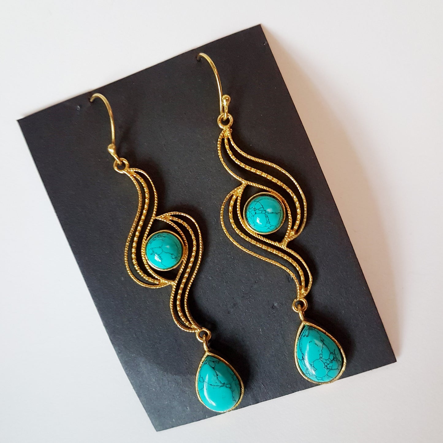Dramatic double labradorite stone earrings. 3 inch length in bronze metal swirl design. Dressy gala boho style. Free shipping. In stock now.