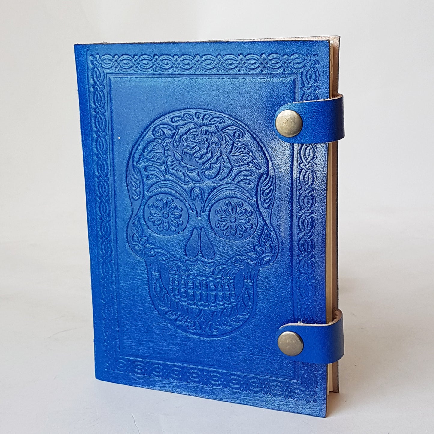 Hand bound colorful leather journal notebook. Leather grimoire with embossed skull design. Halloween Day of the dead, gothic theme diary. 4 vivid colors.