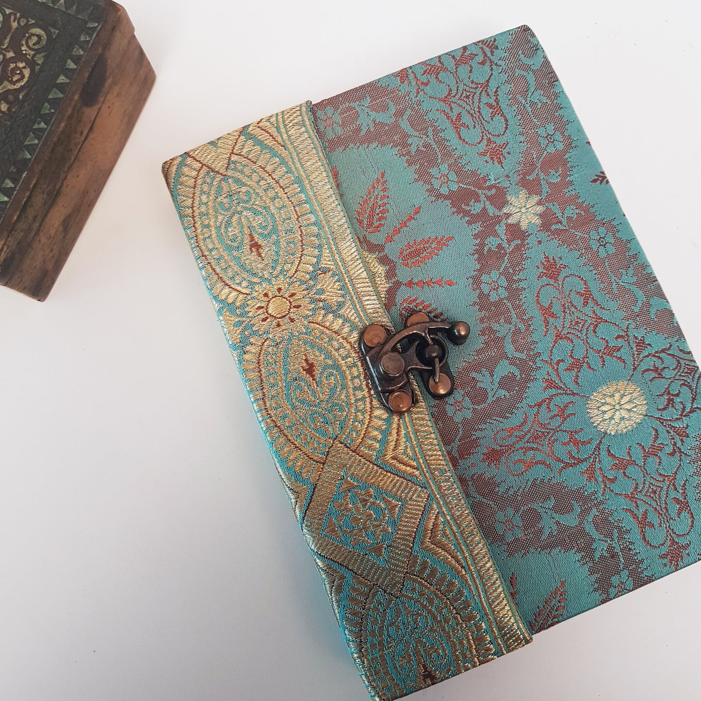 Vintage fabric cover sketchbook journal 5 by 7 inches. One of a kind blank book with premium paper pages. Medieval look bronze metal lock closure.