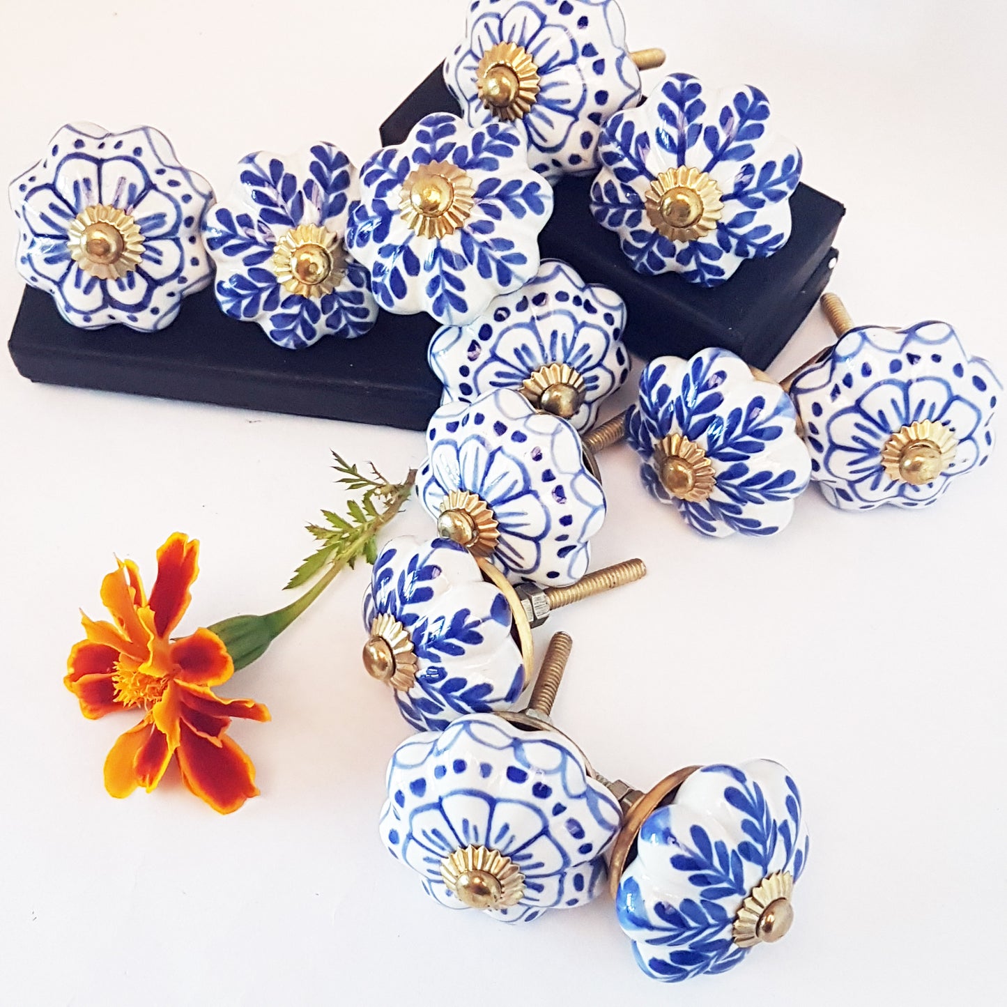 Set of 24 Delft Pattern Blue & White Cabinet Knob Drawer Pulls. Hand painted in vintage style floral patterns. Kitchen cabinet hardware.