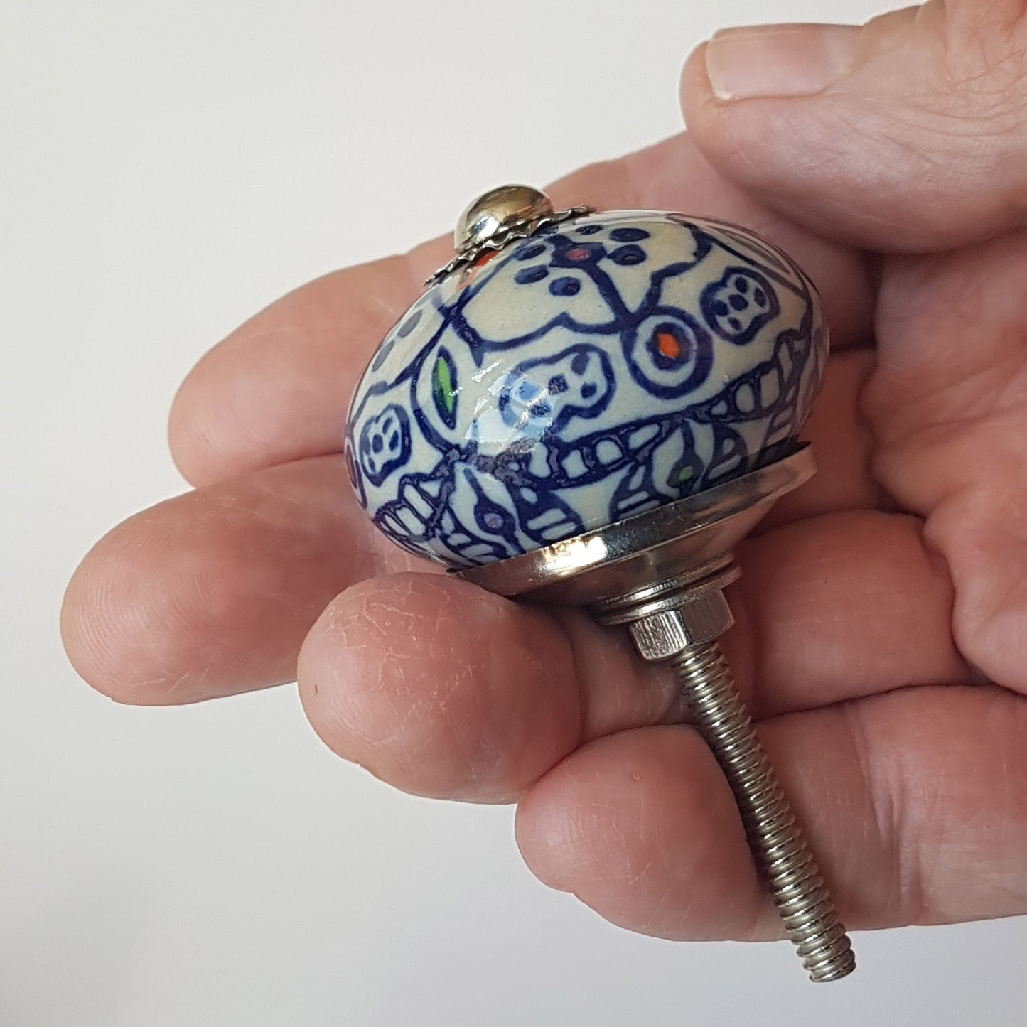 Milfiori set of 8 cabinet knobs-dresser drawer pulls in 8 different hand painted, exclusive designs. 1.5 inch diameter size.