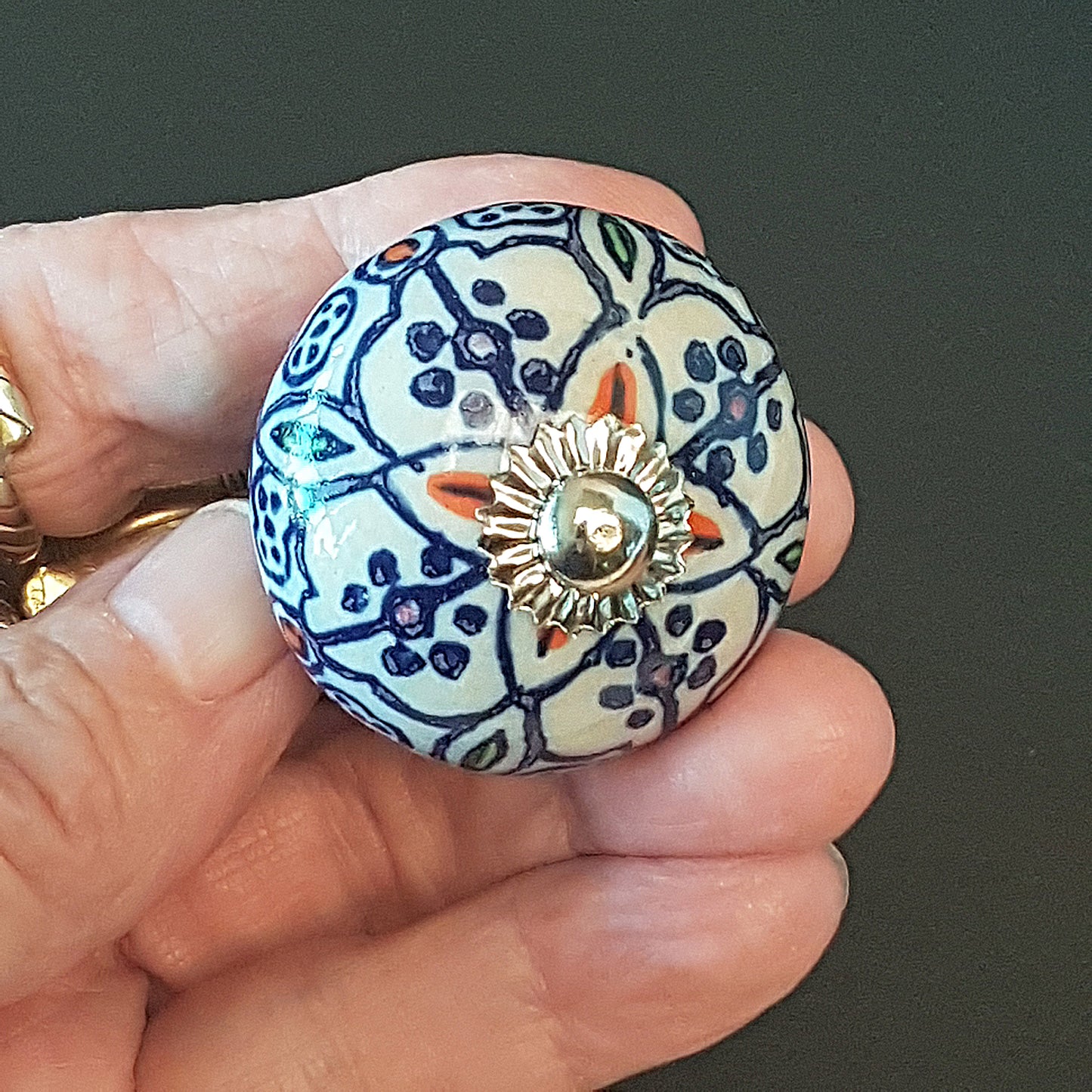 Set of 8 hand painted cabinet knob drawer pulls in vintage designs.