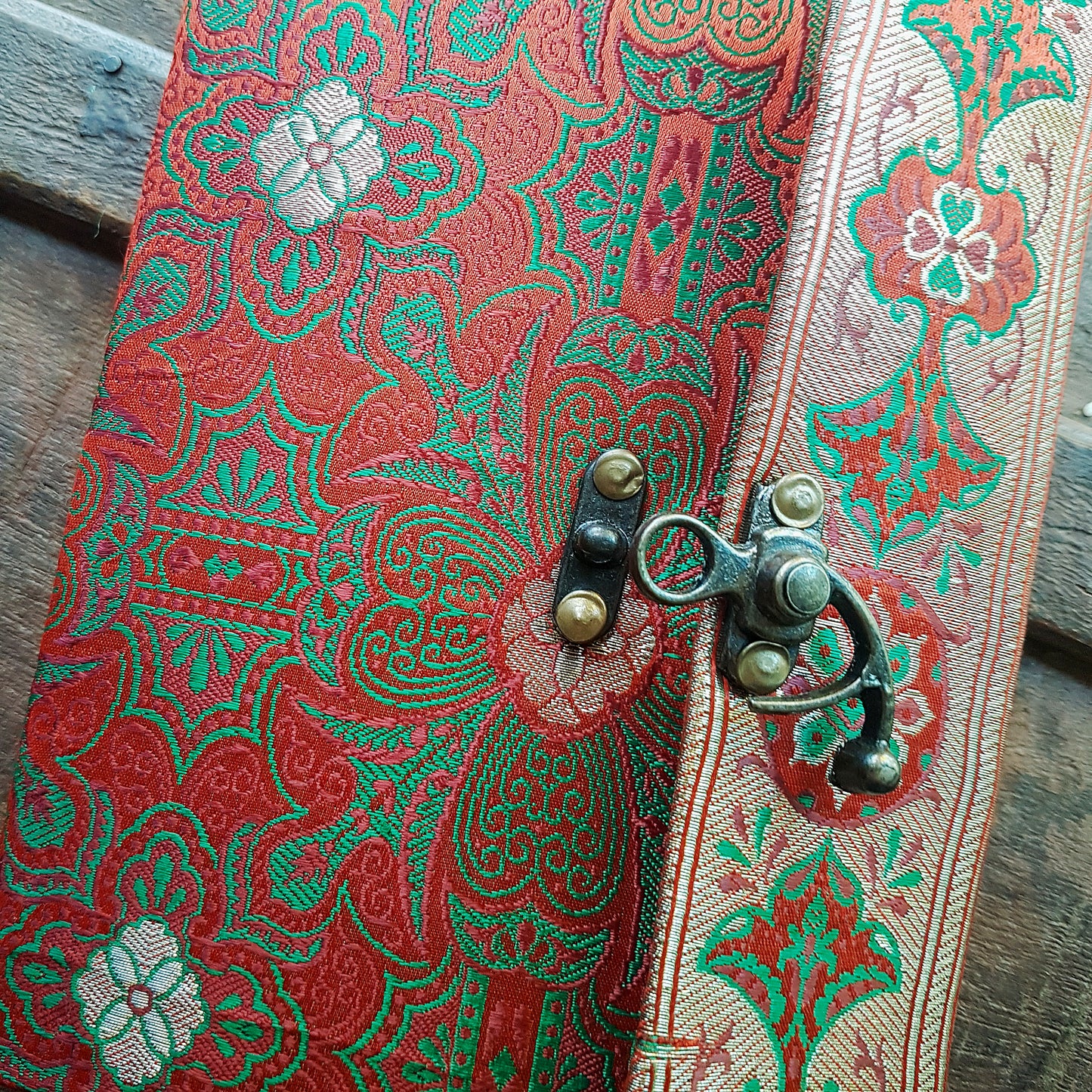 Vintage fabric sketchbook journal 5 by 7 inches. One of a kind blank book with artisan paper pages. Medieval look bronze metal lock closure.