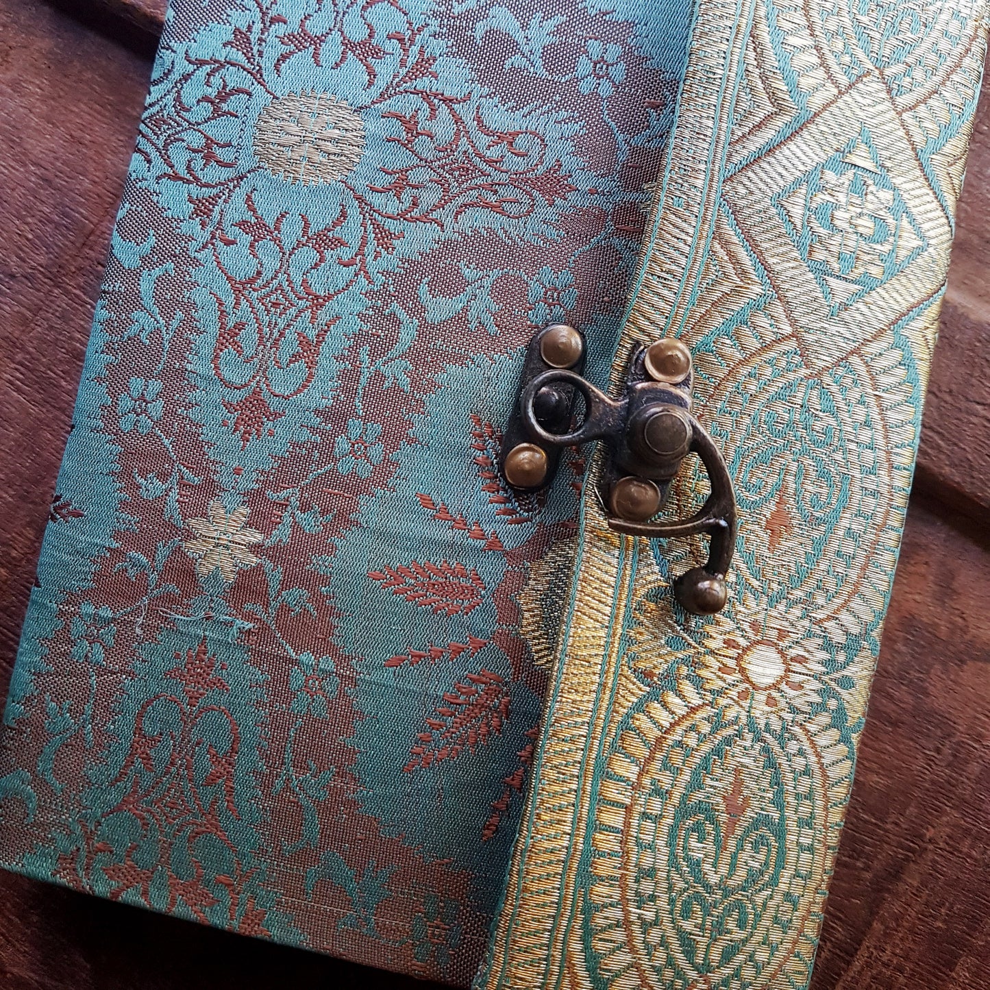 Vintage fabric cover sketchbook journal 5 by 7 inches. One of a kind blank book with premium paper pages. Medieval look bronze metal lock closure.