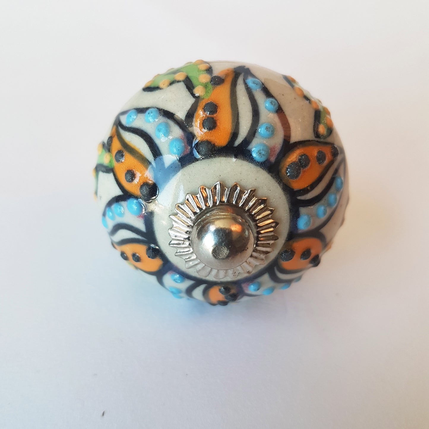 Florentine set of 6 Embossed hand painted knobs in exclusive designs. Standard 1.5 inch size.