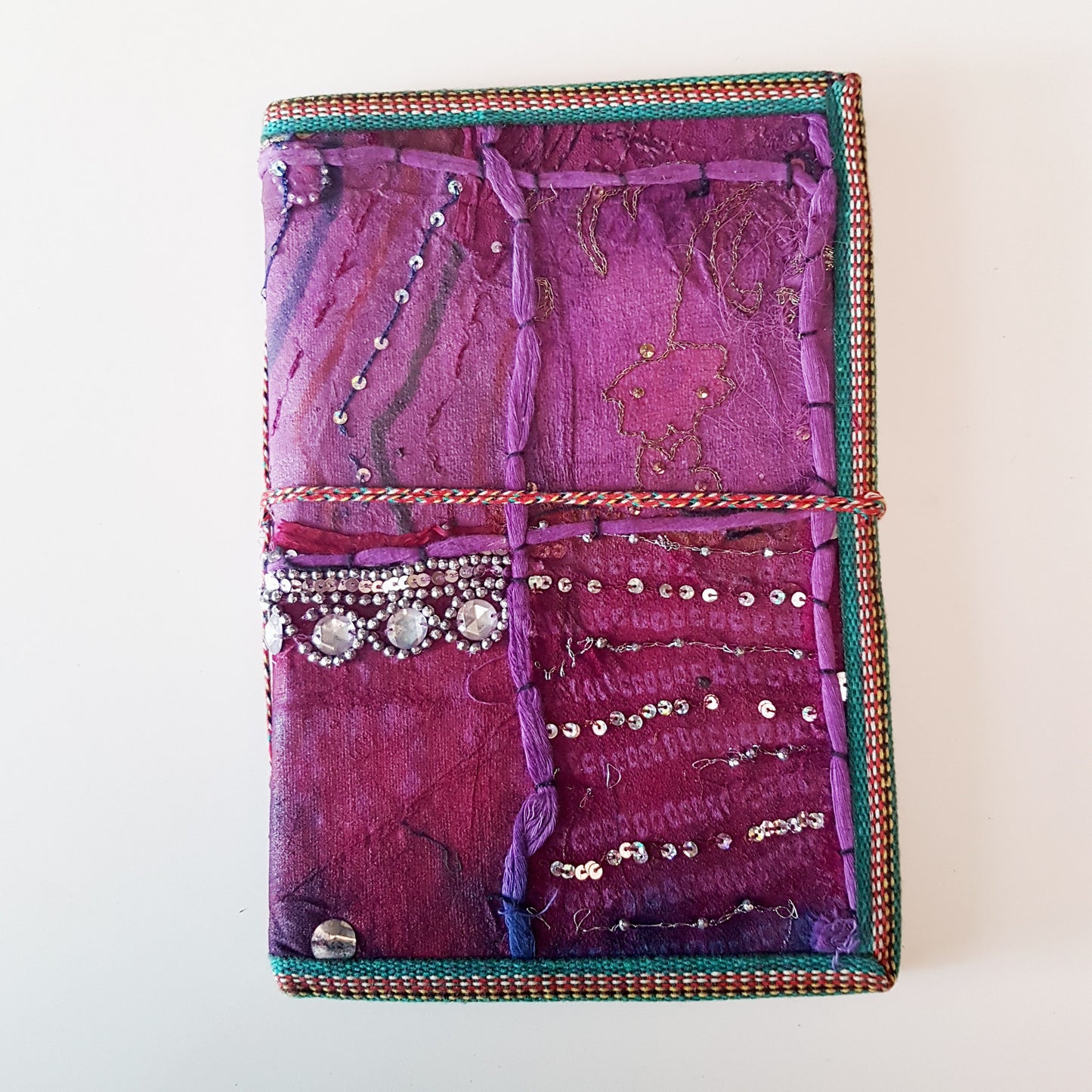 Vintage puple textile art journal 7 x 10 inch blank book. One of kind hardcover handmade notebook diary with a unique beaded jewelled fabric collage cover.
