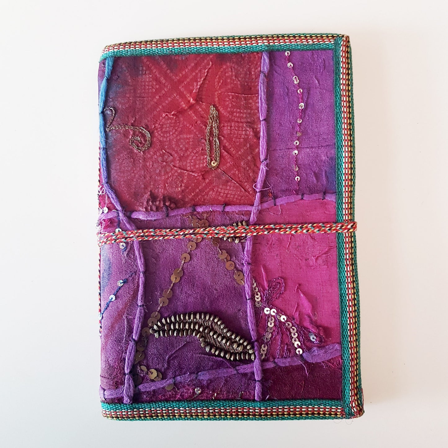 Vintage puple textile art journal 7 x 10 inch blank book. One of kind hardcover handmade notebook diary with a unique beaded jewelled fabric collage cover.