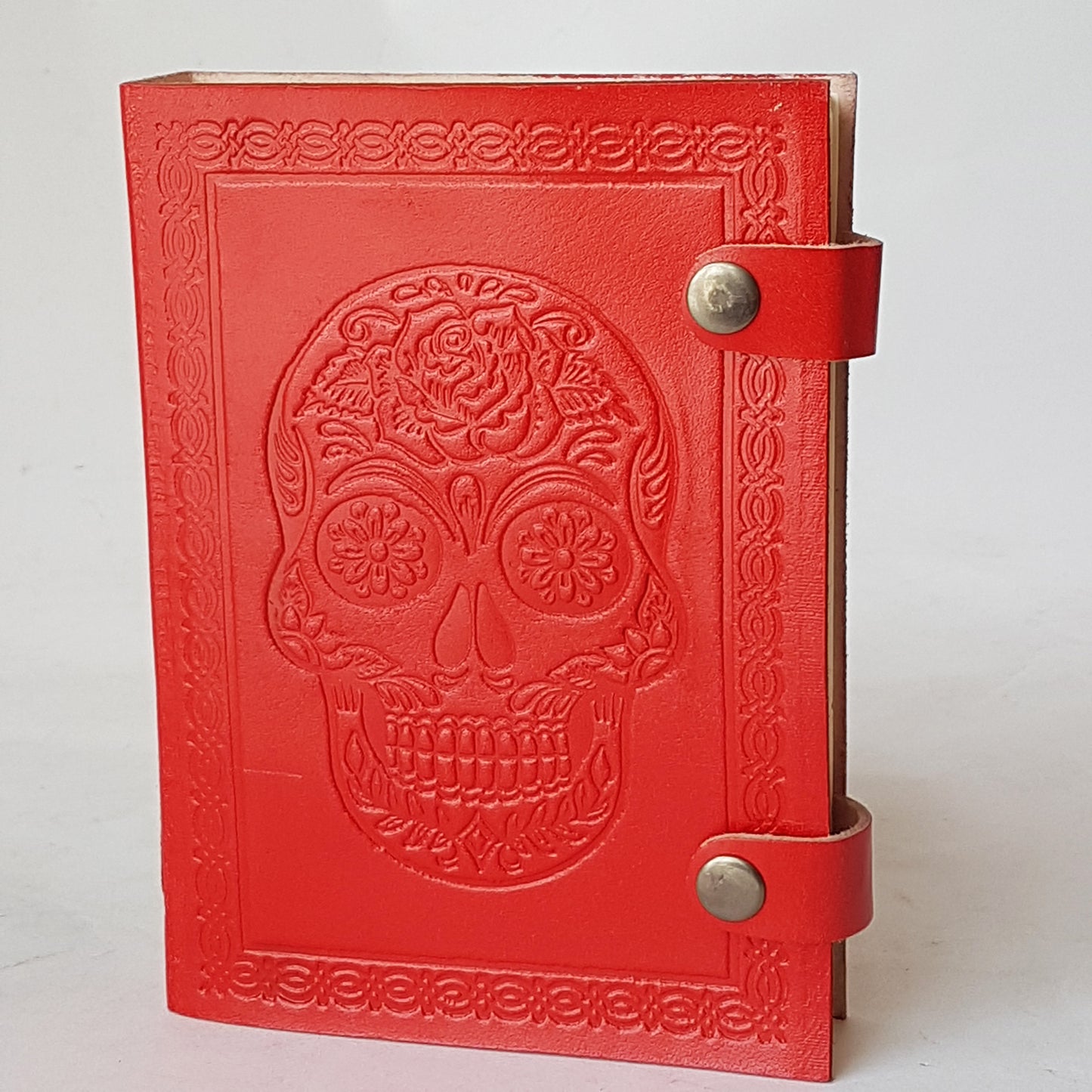 Hand bound colorful leather journal notebook. Leather grimoire with embossed skull design. Halloween Day of the dead, gothic theme diary. 4 vivid colors.