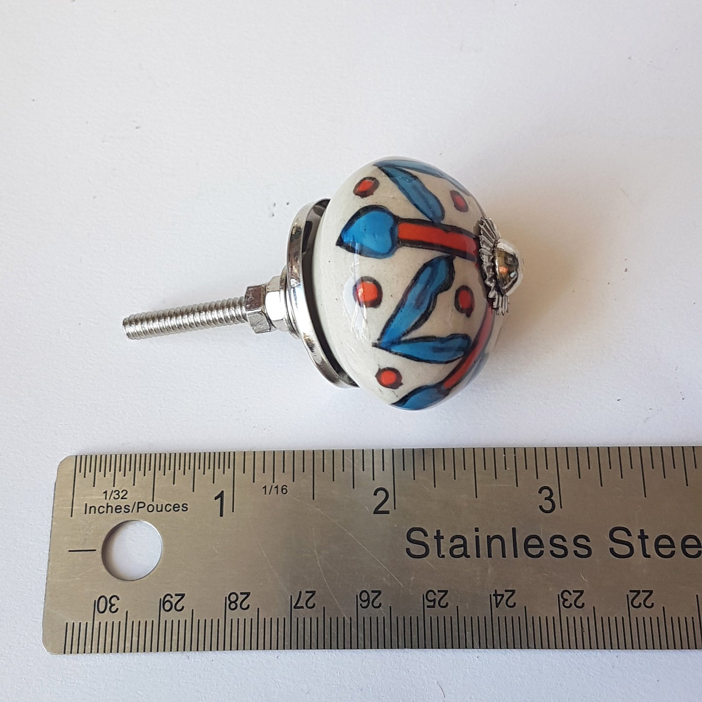 Milfiori set of 8 cabinet knobs-dresser drawer pulls in 8 different hand painted, exclusive designs. 1.5 inch diameter size.