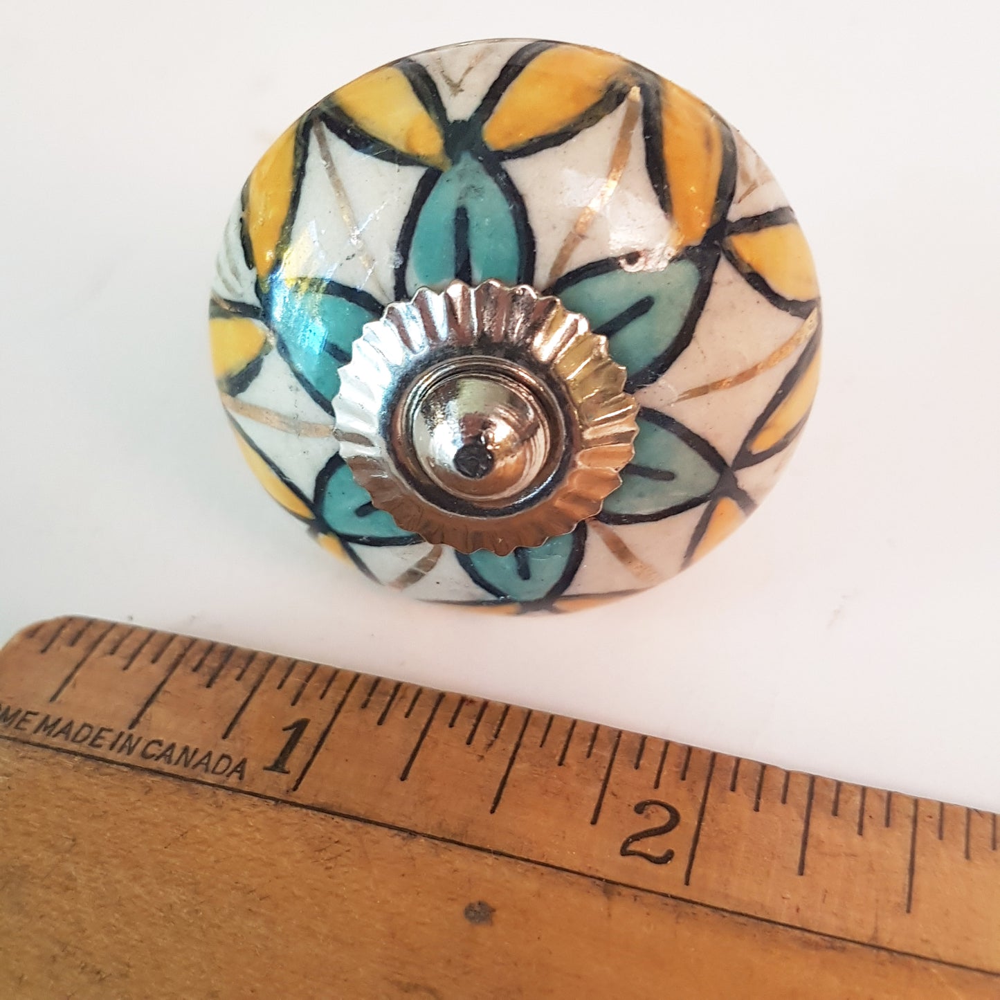 Secret Garden collection of 8 hand painted designer cupboard & drawer knobs in colorful floral patterns. Standard 1.5 inch diameter size.