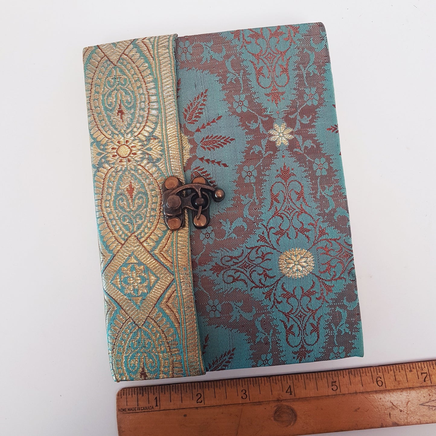 Vintage fabric cover sketchbook journal 5 by 7 inches. One of a kind blank book with premium paper pages. Medieval look bronze metal lock closure.